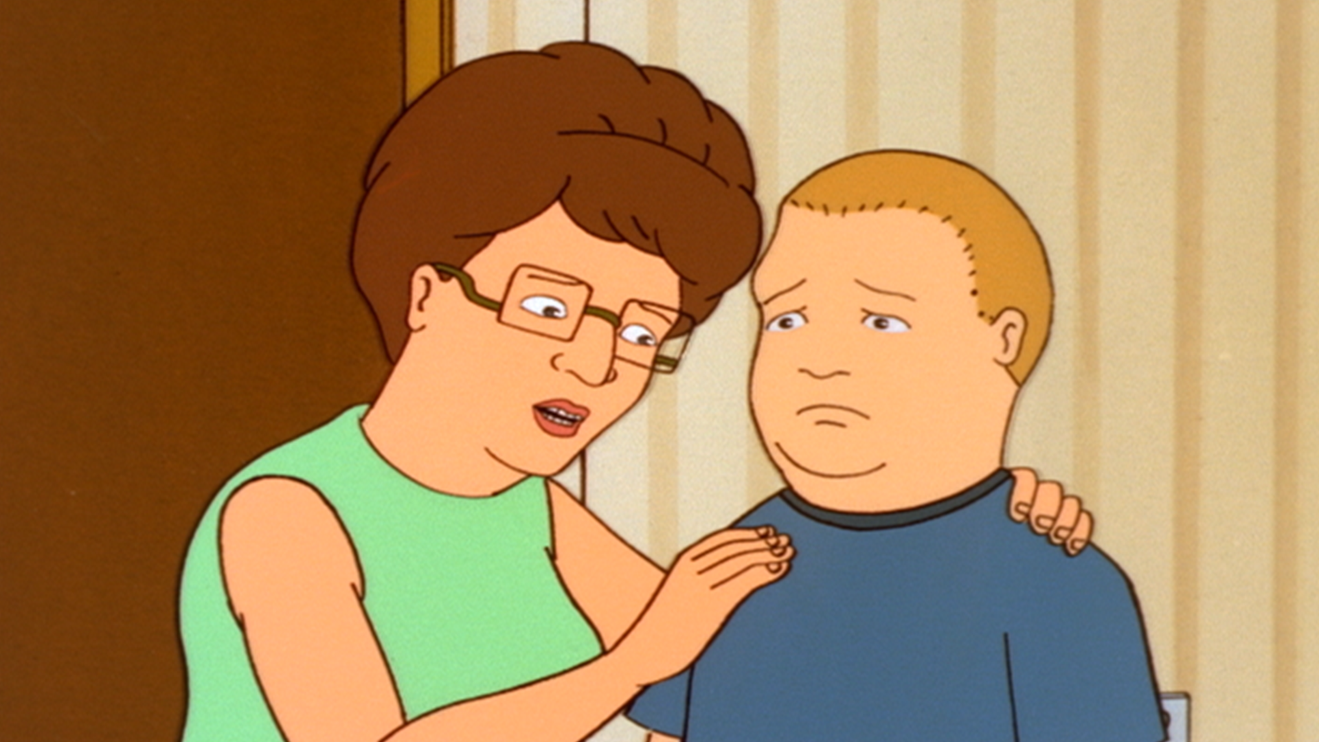 Peggy (Kathy Najimy) places a reassuring hand on a worried Bobby (Pamela Adlon).