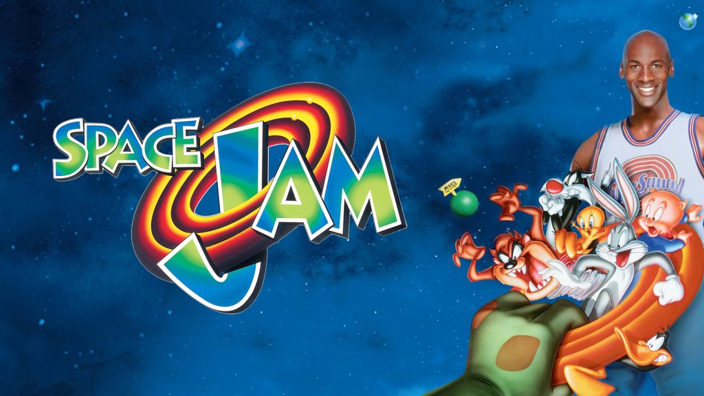 Michael Jordan with Bugs Bunny, Daffy Duck, and the Looney Tunes crew in Space Jam, posing together against a starry blue background.
