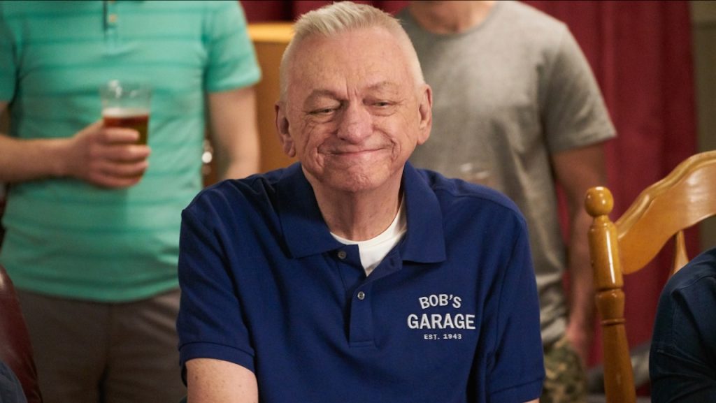 A still image of John Hemphill as Bob Currie in an episode of Schitt’s Creek.