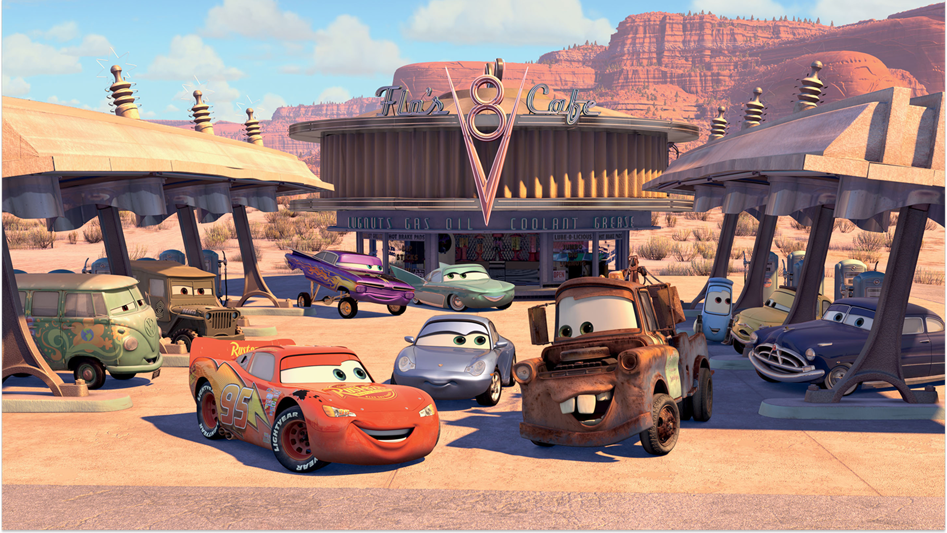 Lightning McQueen, Mater, and others in front of Flo's V8 Cafe in Radiator Springs