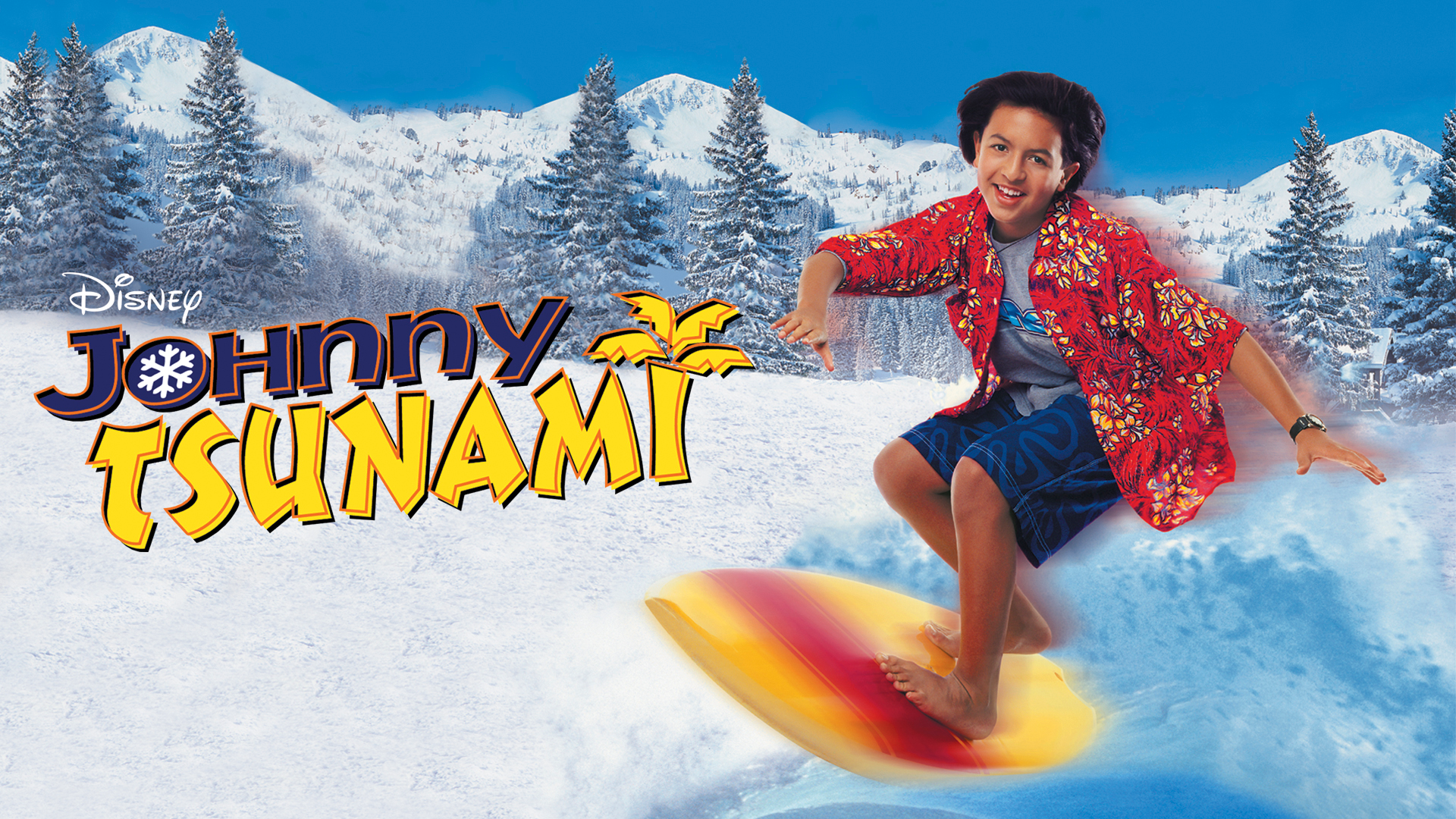 A teenage boy snowboarding on a snowy slope
