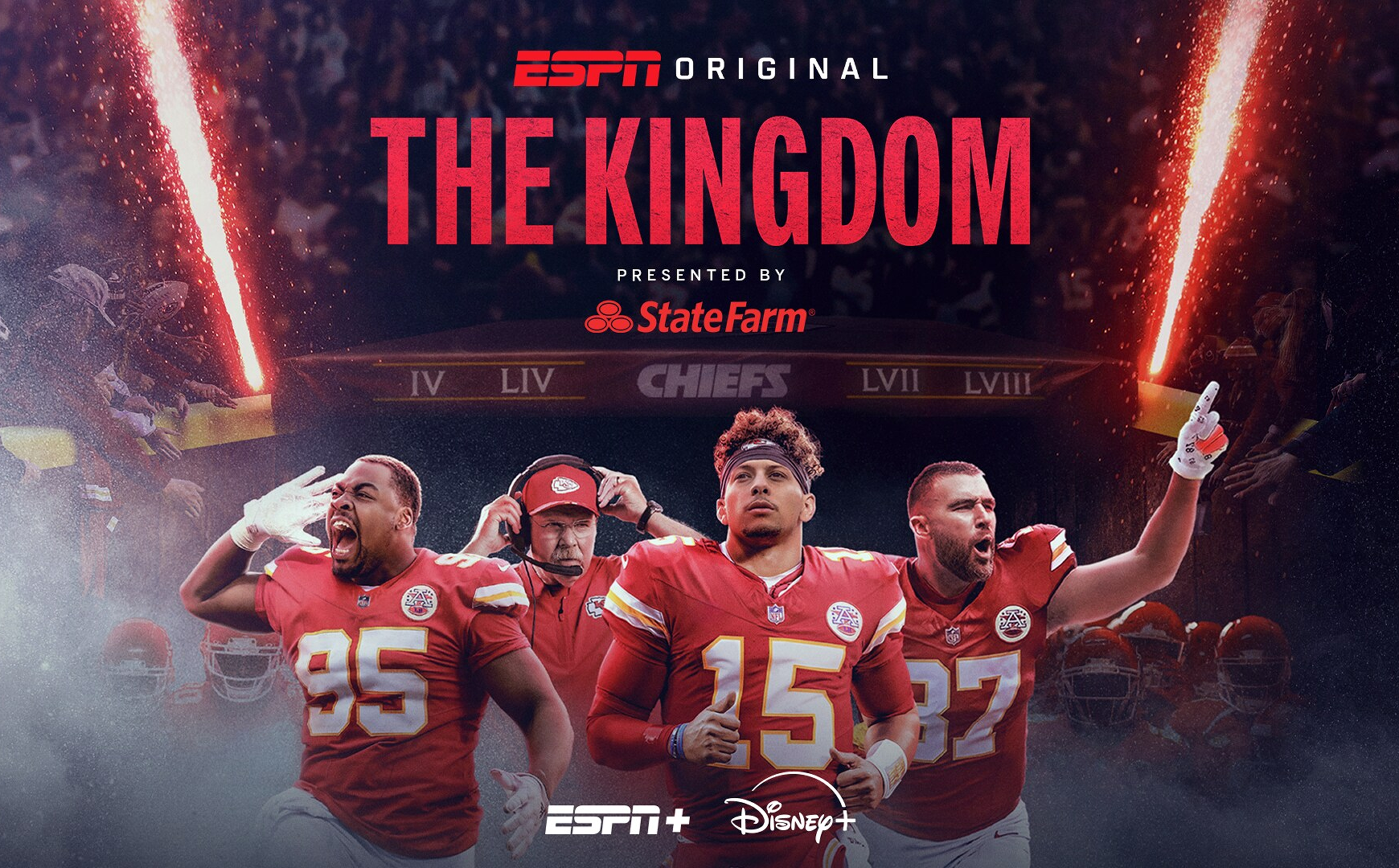 Chris Jones, head coach Andy Reid, Patrick Mahomes, and Travis Kelce running out of the tunnel in front of a crowd.