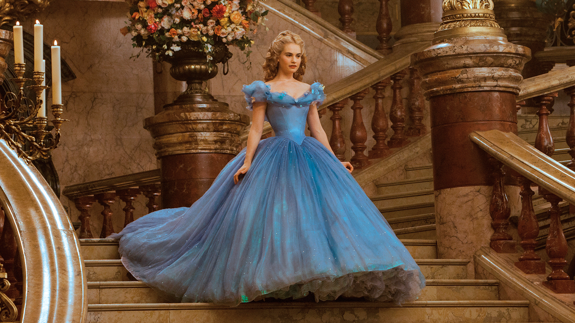 Lily James as Cinderella, in the iconic blue ballgown from Disney's 2015 live-action Cinderella