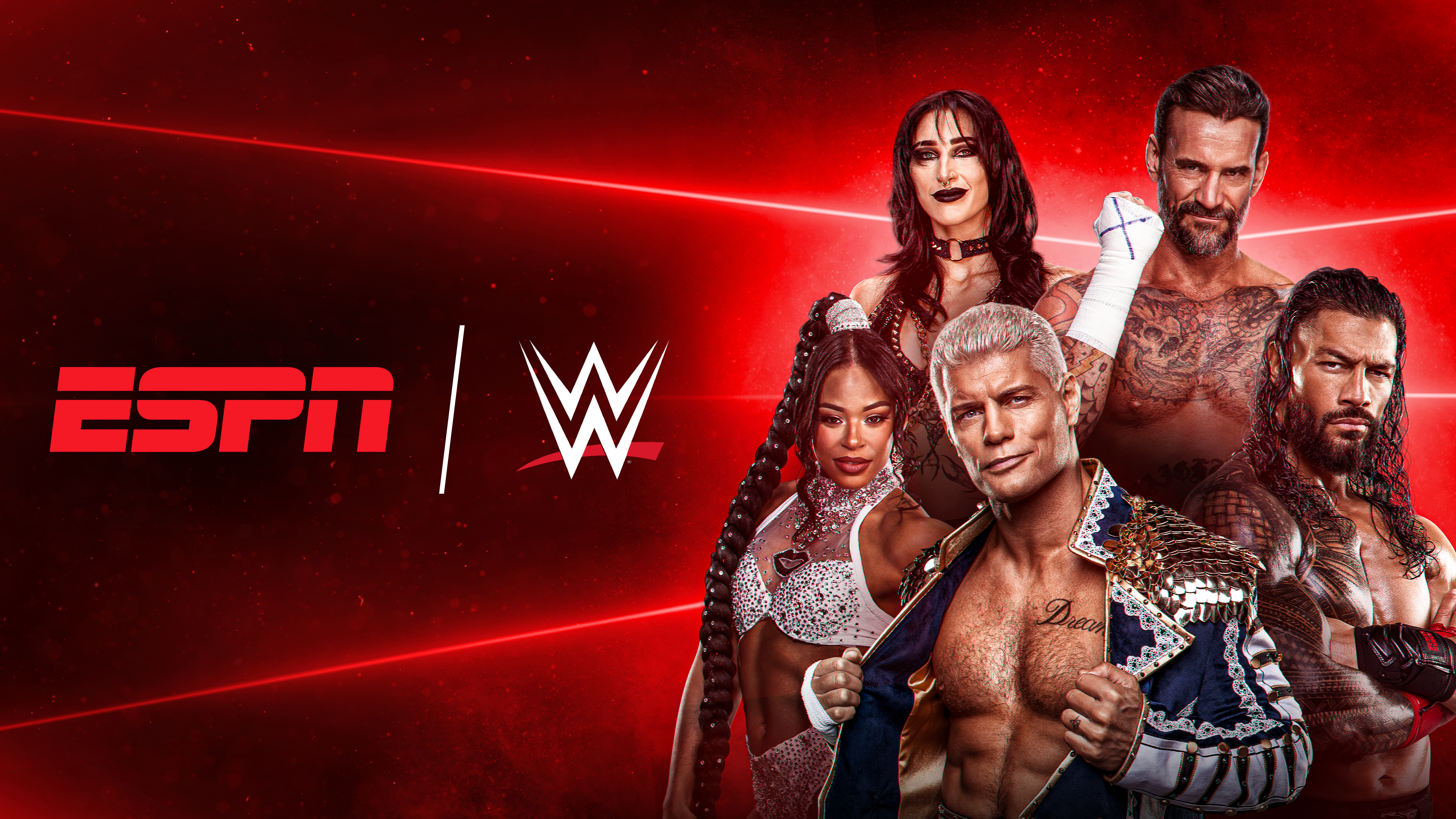 Image featuring Bianca Belair, Rhea Ripley, Codey Rhodes, CM Punk, and Roman Reigns