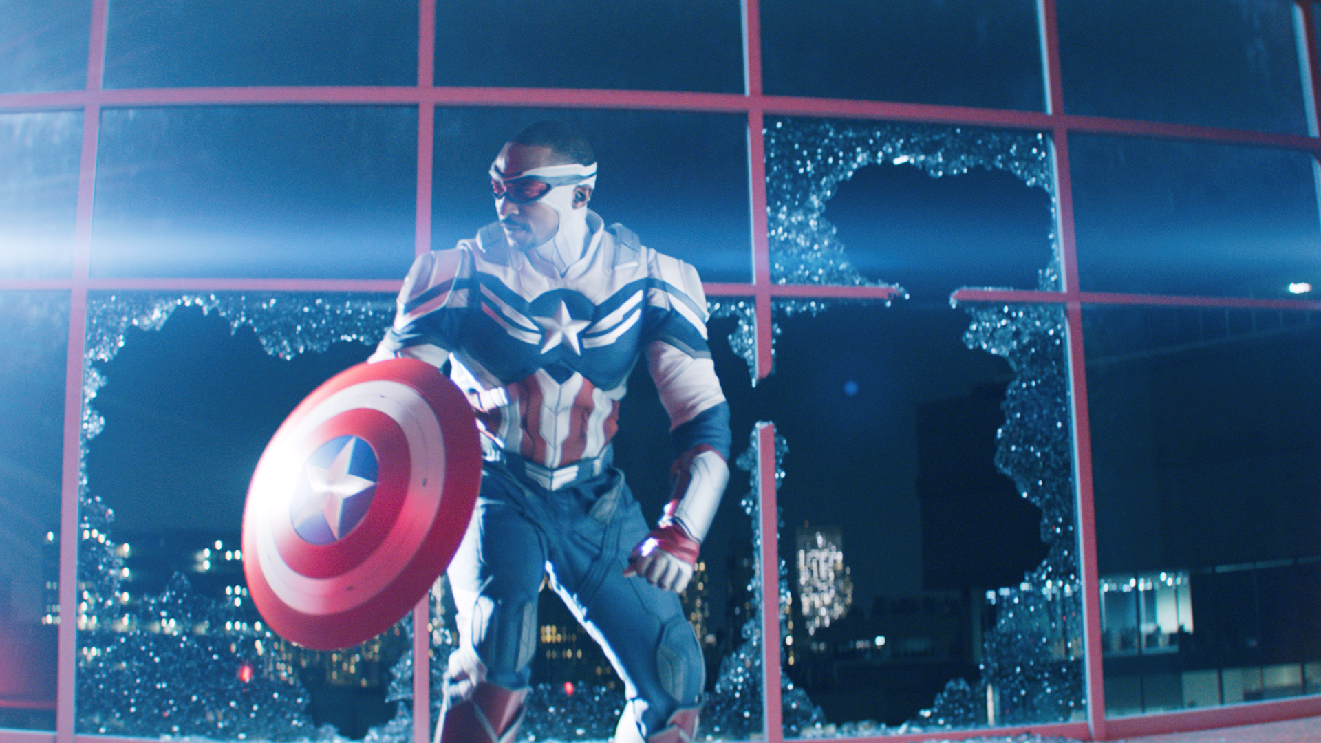Sam Wilson (Anthony Mackie) takes on the mantle of Captain America and wields the iconic shield.