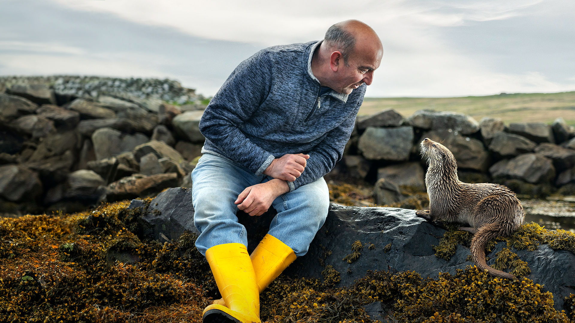 This image captures a special moment from the award-winning National Geographic documentary "Billy & Molly: An Otter Love Story". 