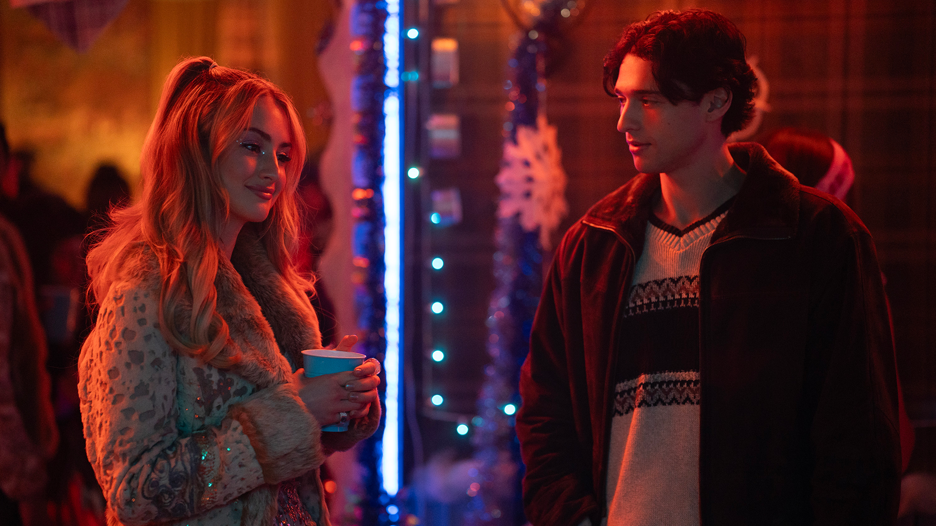 Lucy Albright (Grace Van Patten) talks to Alex (Costa D'Angelo) at a party