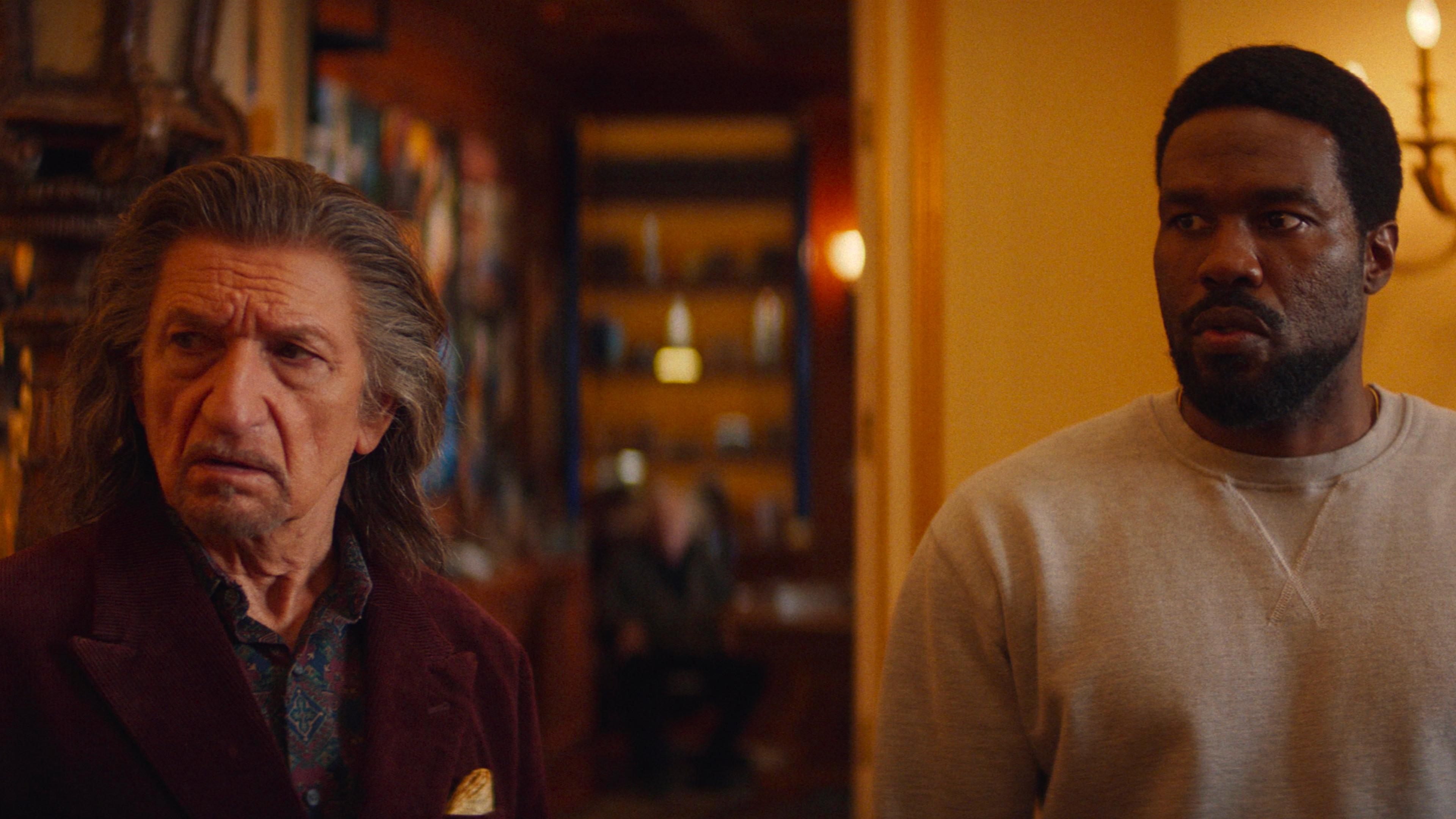 A closeup of Wonder Man (Yahya Abdul-Mateen II) and Trevor Slattery (Ben Kingsley) in Wonder Man