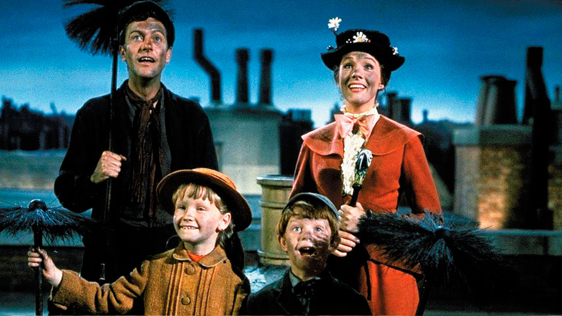 Dick Van Dyke, Julie Andrews, Karn Dotrice, and Matthew Garber in Mary Poppins