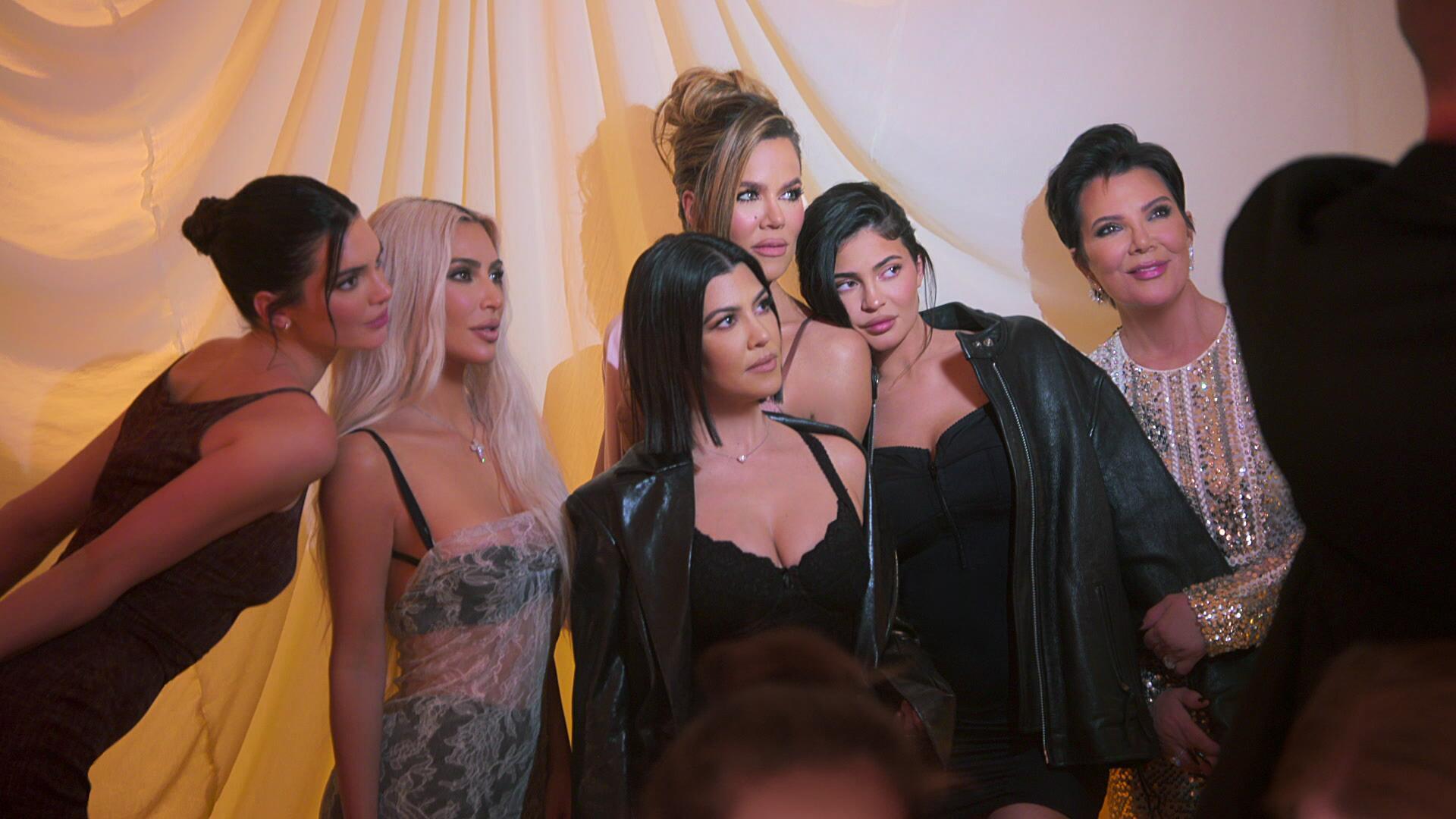 The Kardashian-Jenner family gathers for a group photo in The Kardashians.