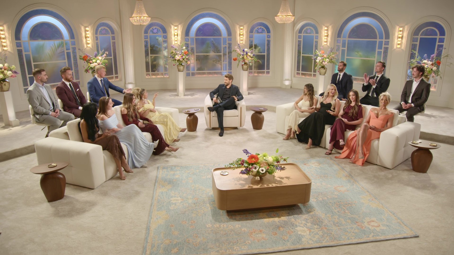 Wide shot of the cast of The Secret Wives of Mormon Wives during the Season 2 Reunion Special.