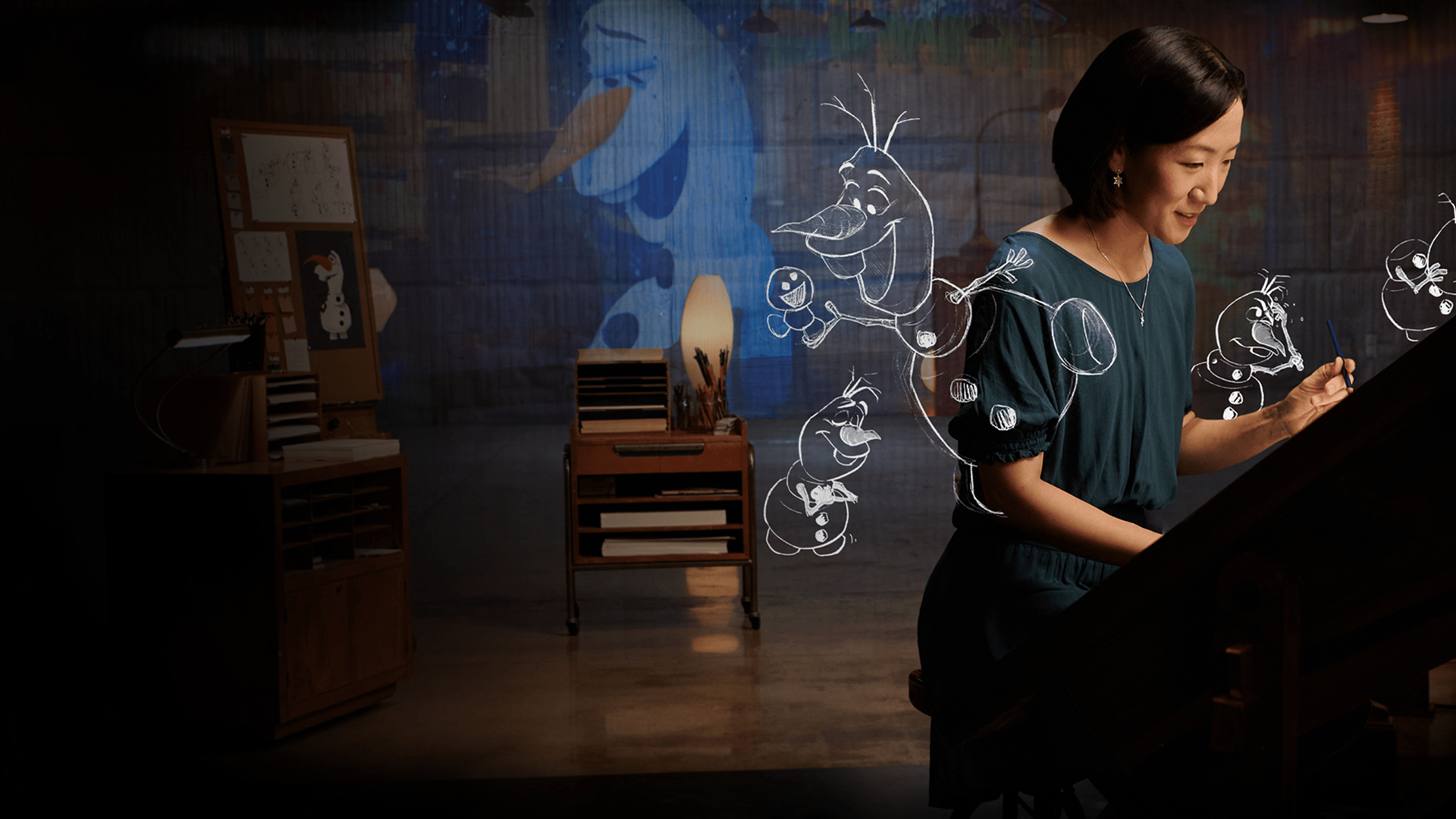 A woman working on a drawing board in Disney's Sketchbook 