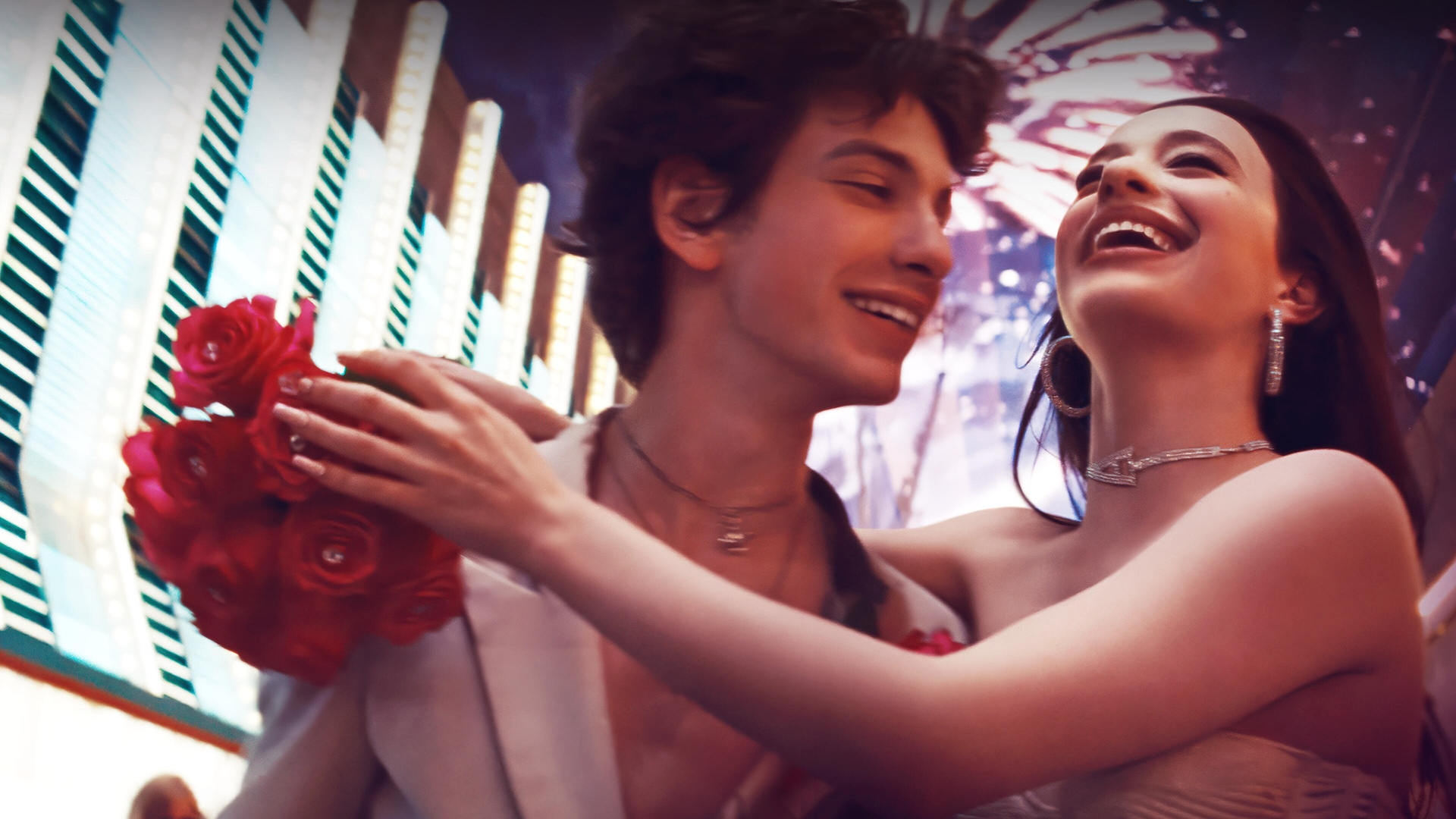 A blurred image of Vanya (Mark Eydelshteyn) and Ani (Mikey Madison) in a Las Vegas hotel