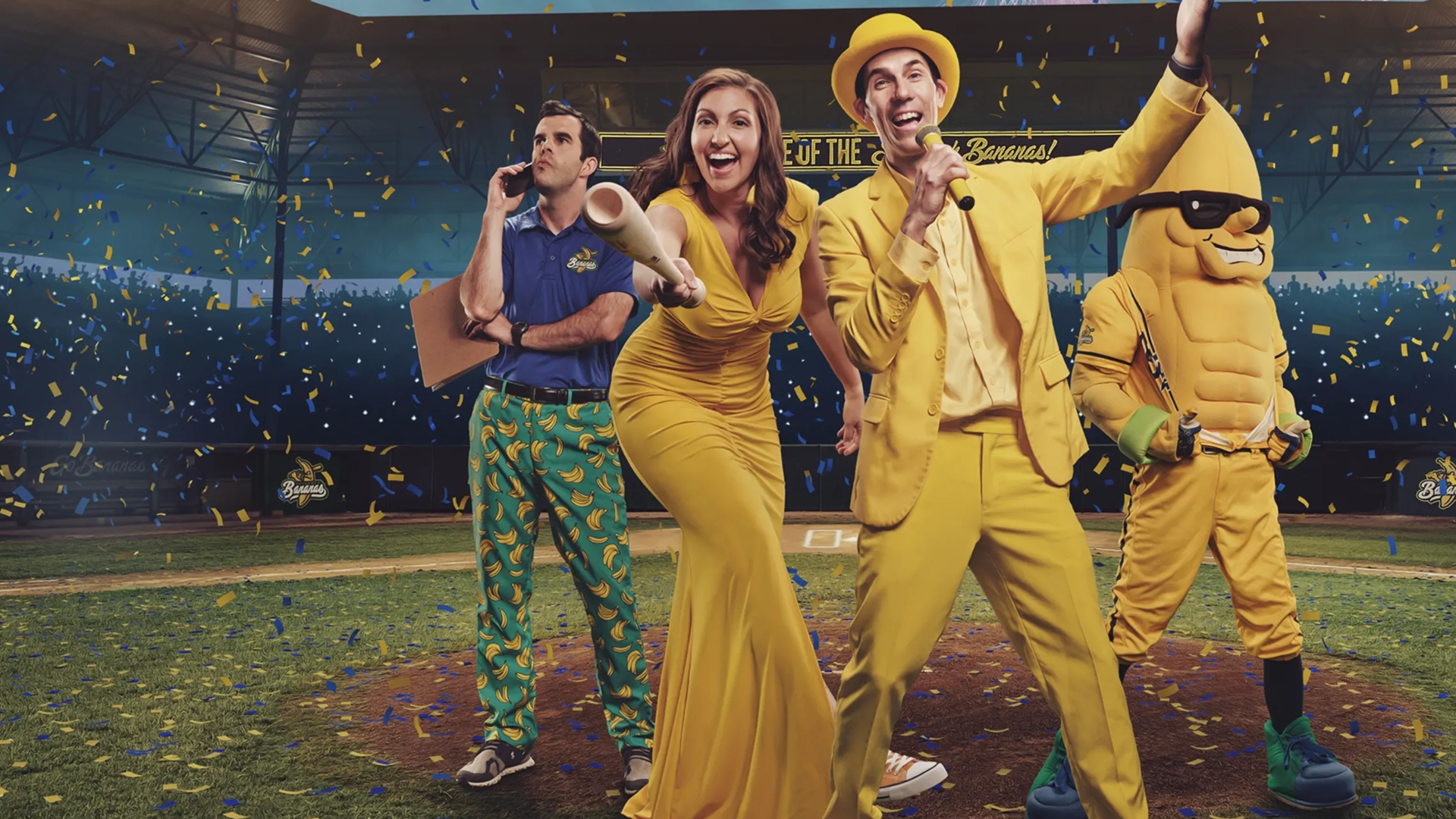 Members of the Savannah Bananas celebrating on the field at Bananaland