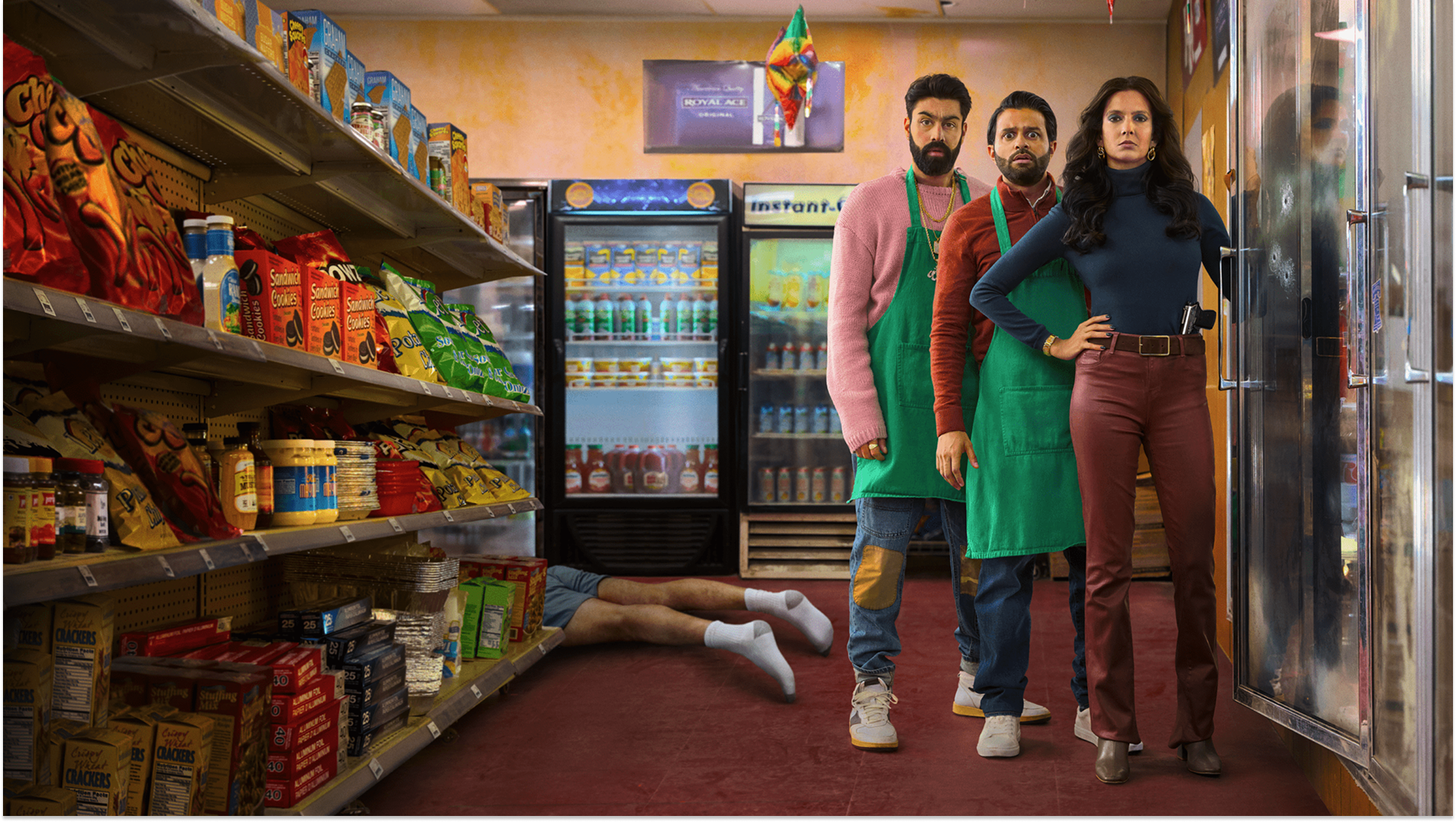 Key art for Deli Boys Season 2 featuring the main cast members covered in a pool of 100 dollar bills.