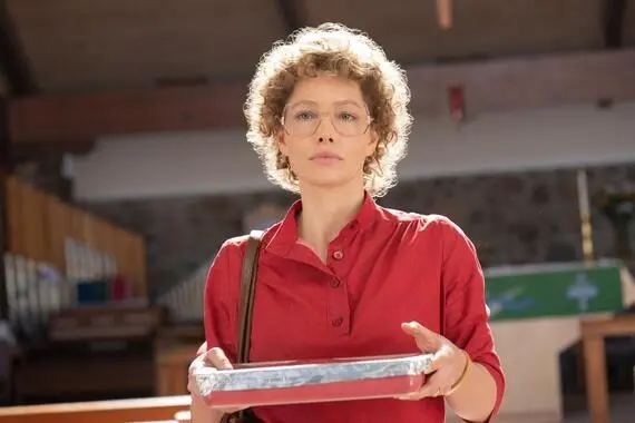 Still photo from Hulu Original Series Candy holding a dish