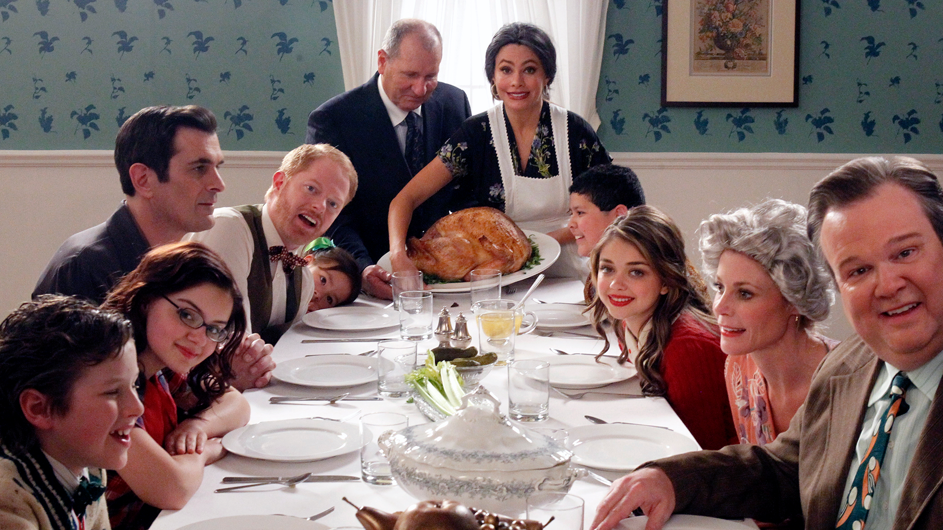 The cast of Modern Family recreating Norman Rockwell’s painting "Freedom from Want" in Season 3, Episode 23, "Tableau Vivant"