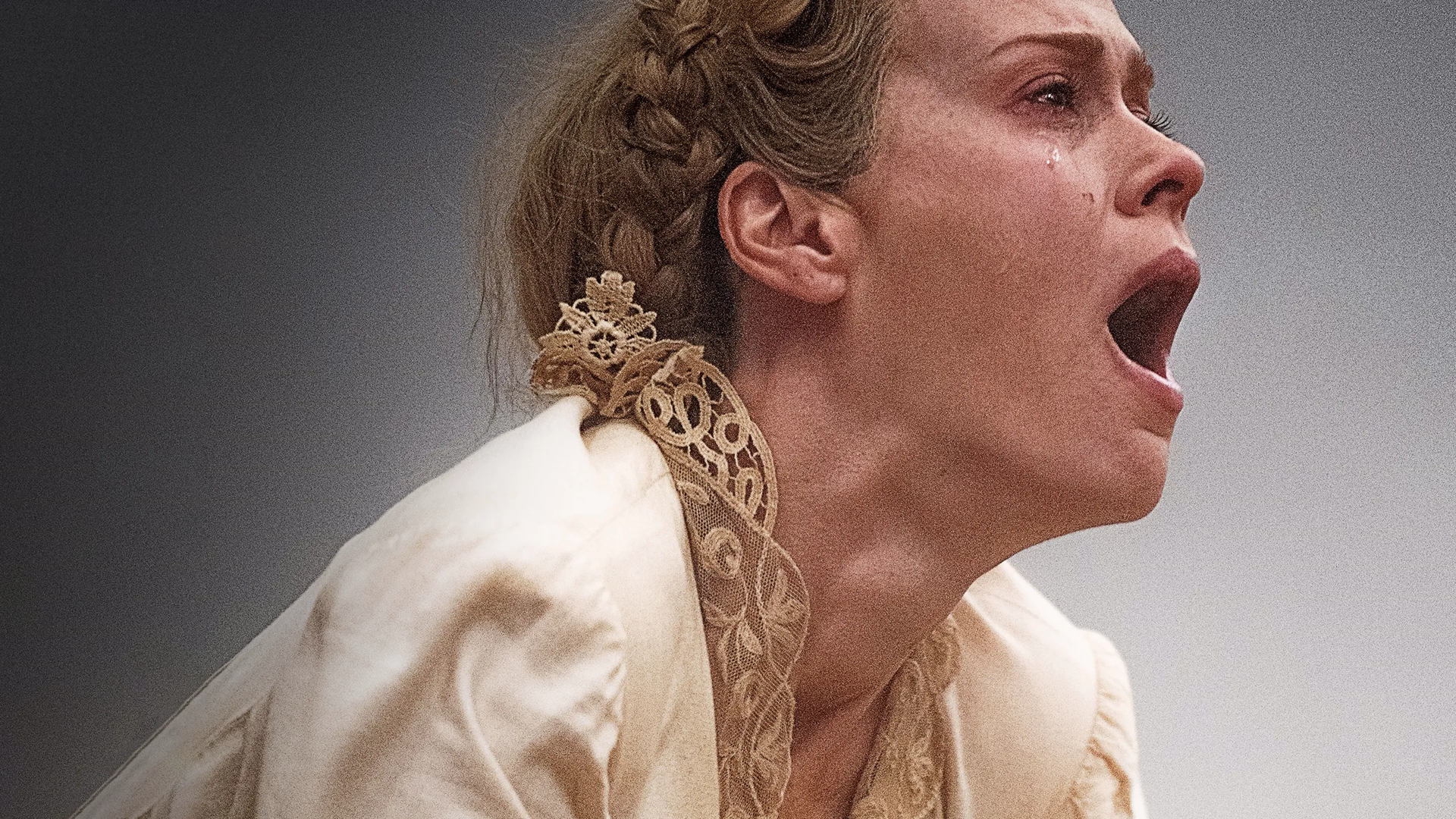 Margaret Bellum (Sarah Paulson) embodies pure fear as they scream in horror in Hold Your Breath. 