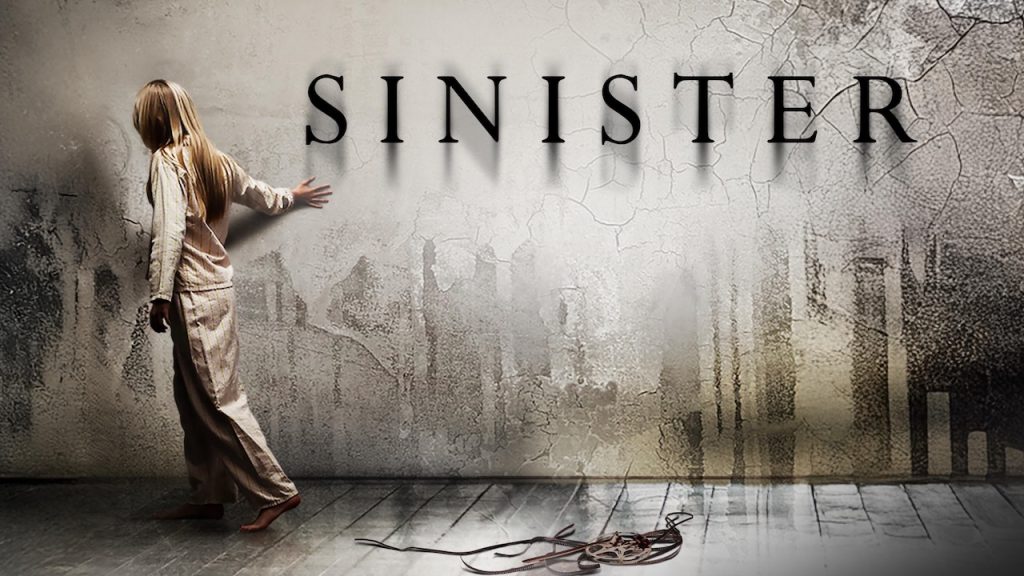 Poster for Sinister showing a young girl in pajamas smearing blood across a cracked wall that forms a demonic face, with an old film reel on the floor and the movie title above her.