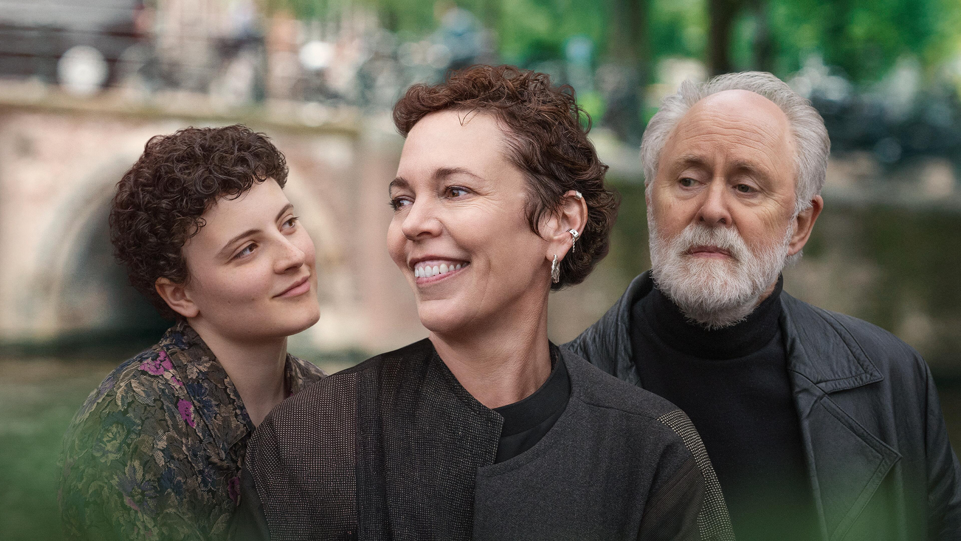 This image features actors Olivia Colman and John Lithgow in a scene from the 2025 drama film Jimpa.