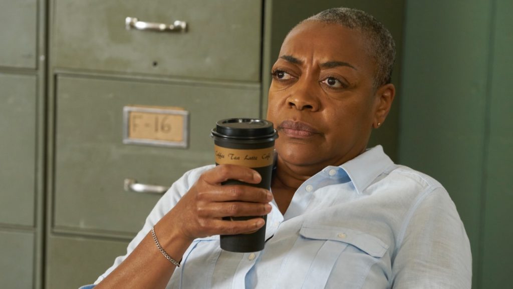 A still image of Karen Robinson as Ronnie Lee in an episode of Schitt’s Creek.