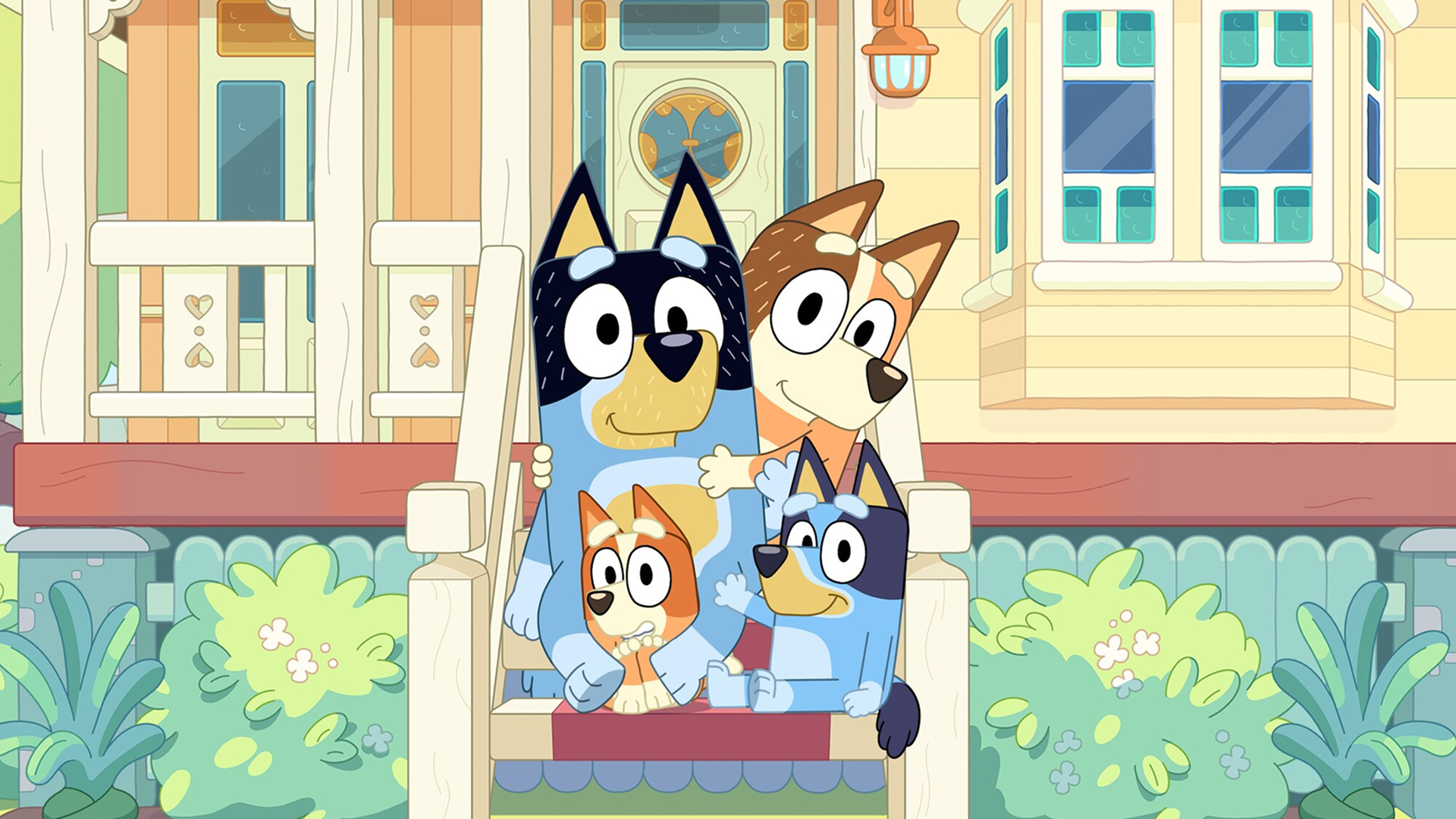 A família de Bluey reunida na varanda.