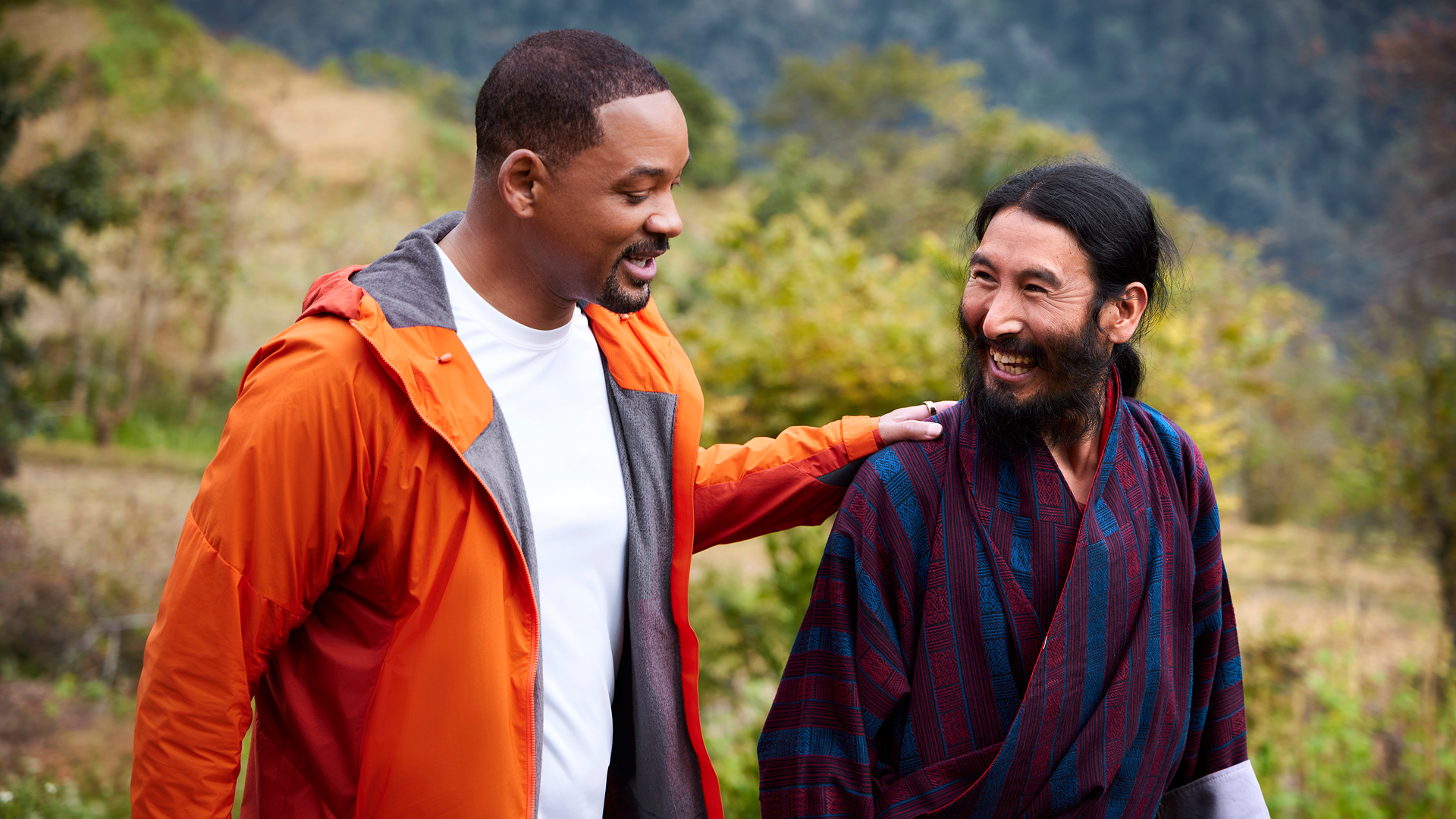 This image shows actor Will Smith with a local guide in Bhutan during the filming of the National Geographic docuseries Pole to Pole with Will Smith. 