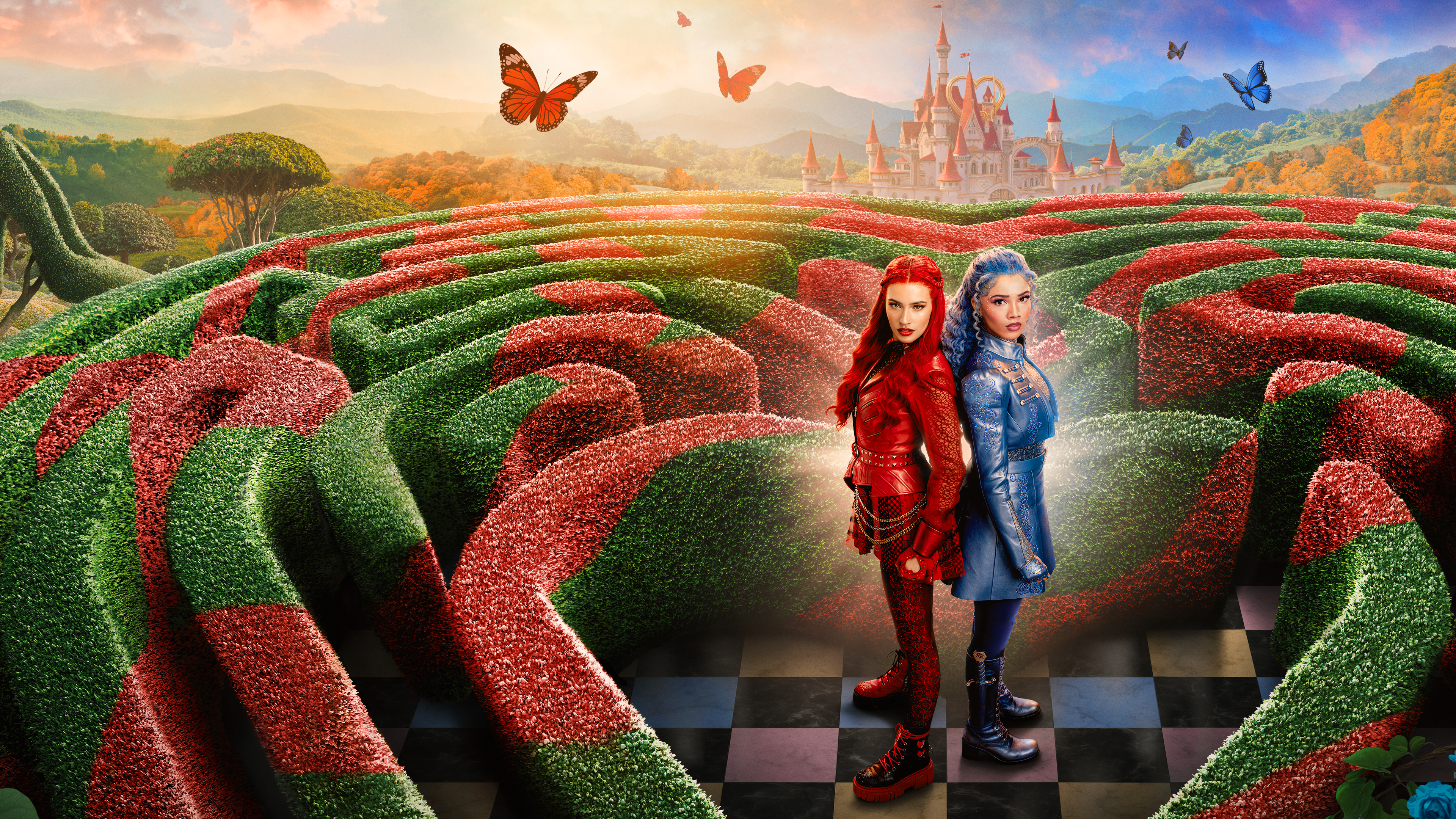  Red (played by Kylie Cantrall), the daughter of the Queen of Hearts, dressed in her signature red attire, and Chloe Charming (played by Malia Baker) in Descendants: Wicked Wonderland