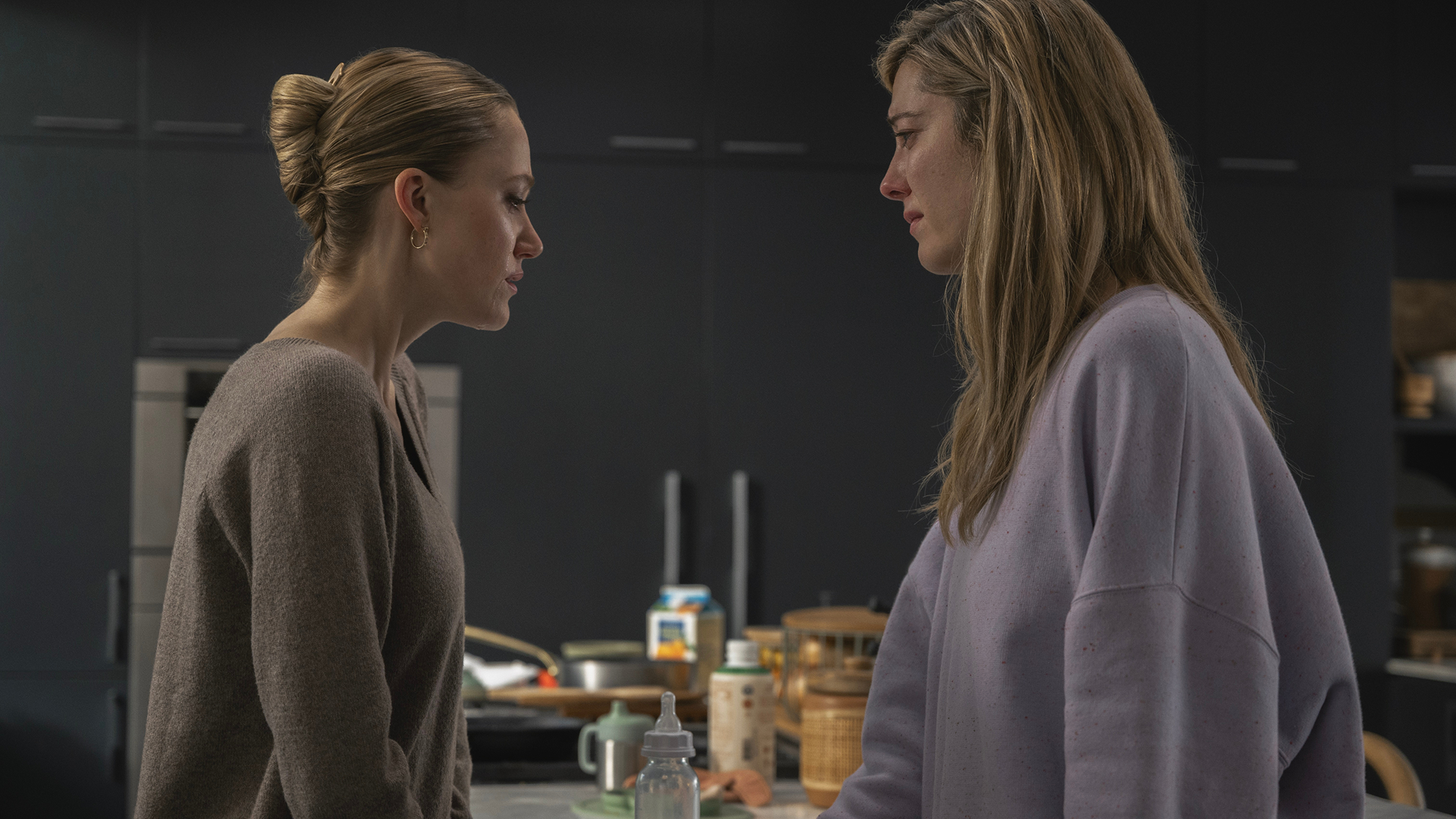 Mary Elizabeth Winstead and Maika Monroe in a scene from the 2025 movie, The Hand That Rocks the Cradle.