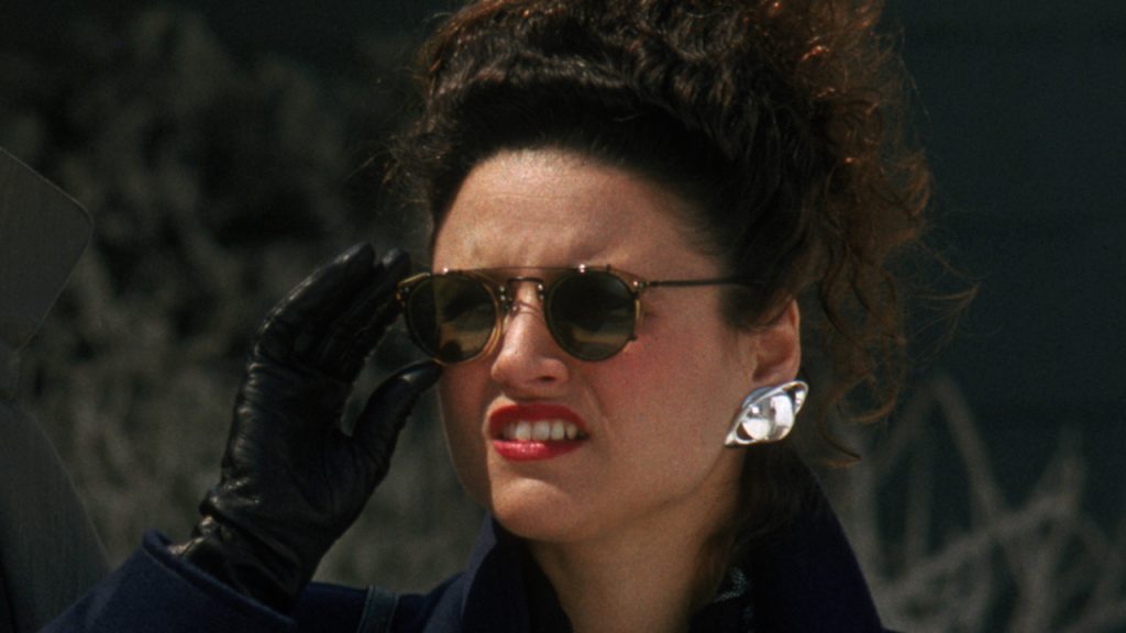 A still image of Julia Louis-Dreyfus as Margo Chester in Christmas Vacation.