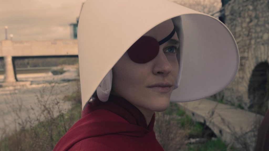 A still image of Madeline Brewer as Janine Lindo in The Handmaid’s Tale.