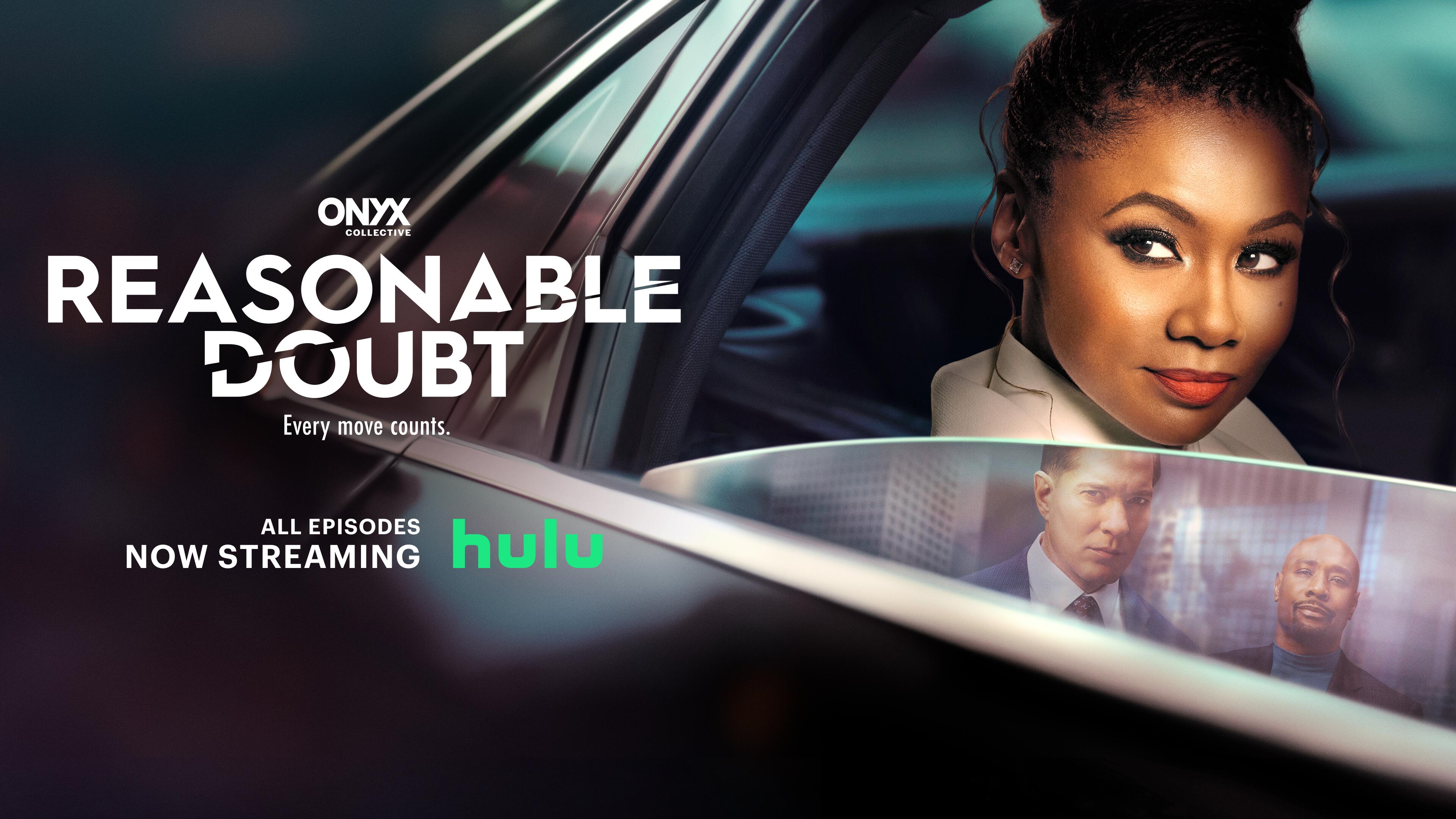 Jax Stewart, played by Emayatzy Corinealdi looks out of a car window that's partly rolled down. In the window's reflection we see two men
