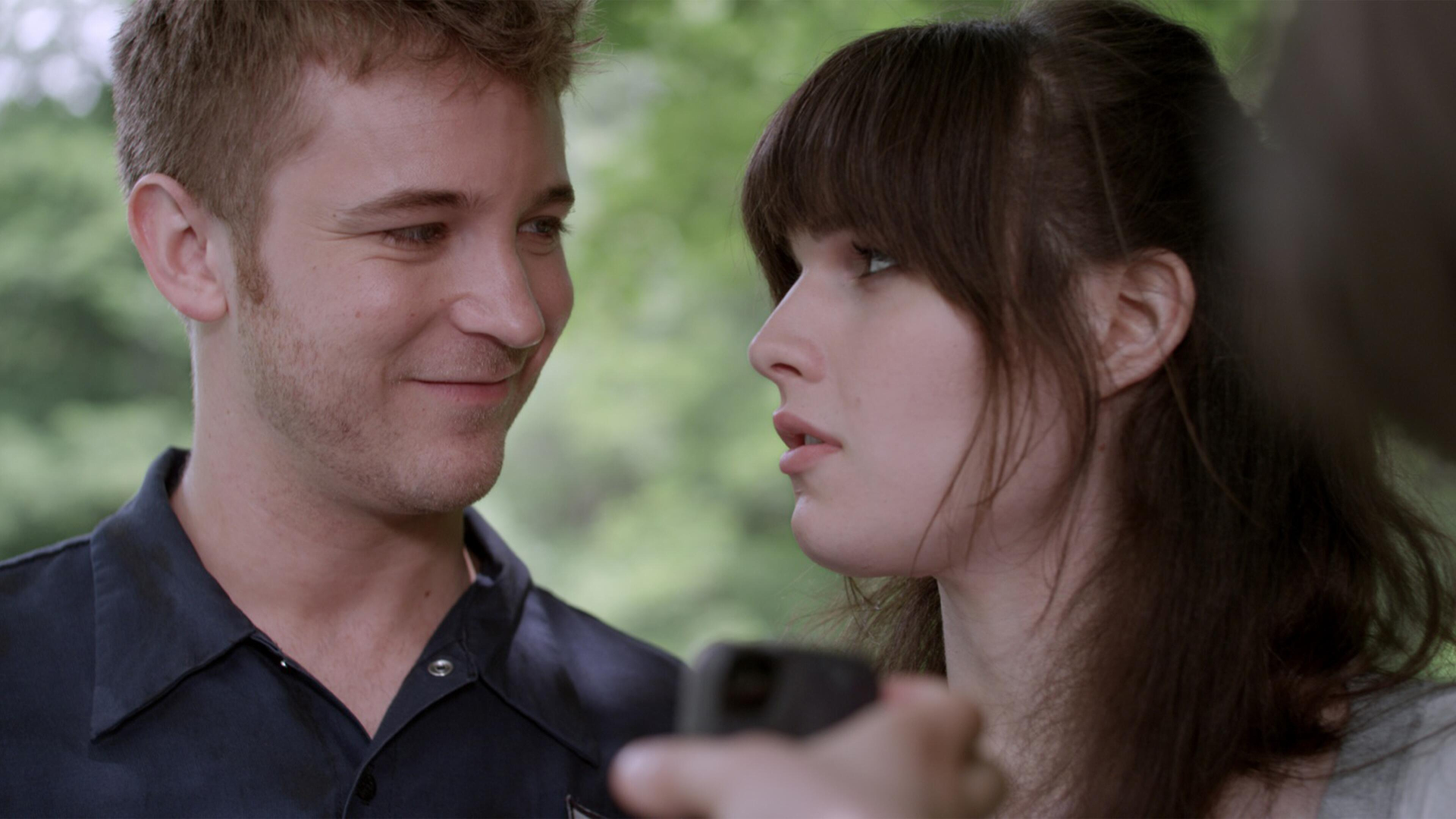 Robby (Michael Welch) and Ricky (Michelle Hendley) looking at each other