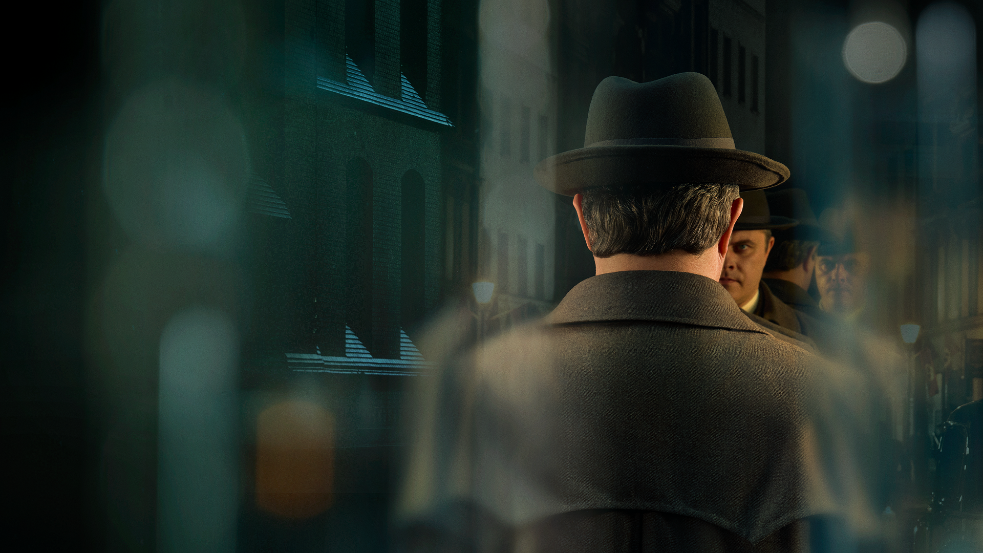 Promotional image for the crime thriller television series The Breslau Murders set in 1936 showing a detective from behind.