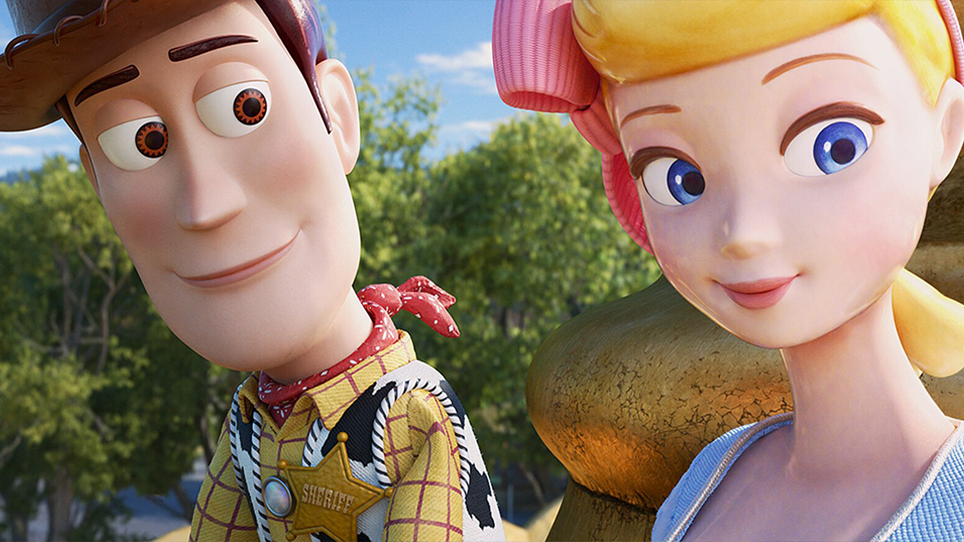 Woody admires Bo Peep while smiling as Bo Peep stares off to the right 