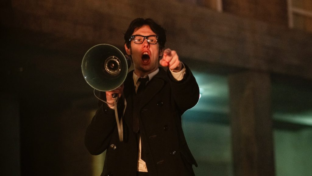 A still image of Josh Finan as Gerry Adams in the series, Say Nothing.