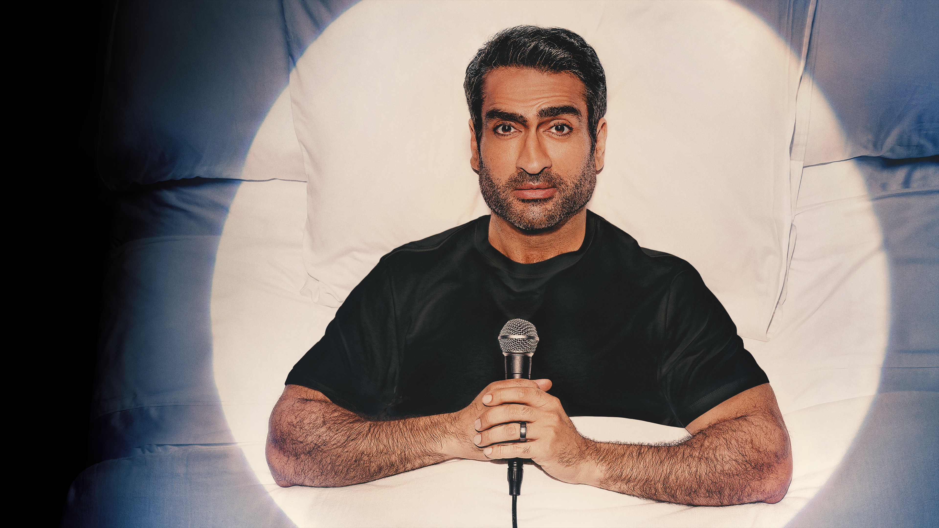 The image features actor and comedian Kumail Nanjiani promoting his stand-up special, Night Thoughts. 