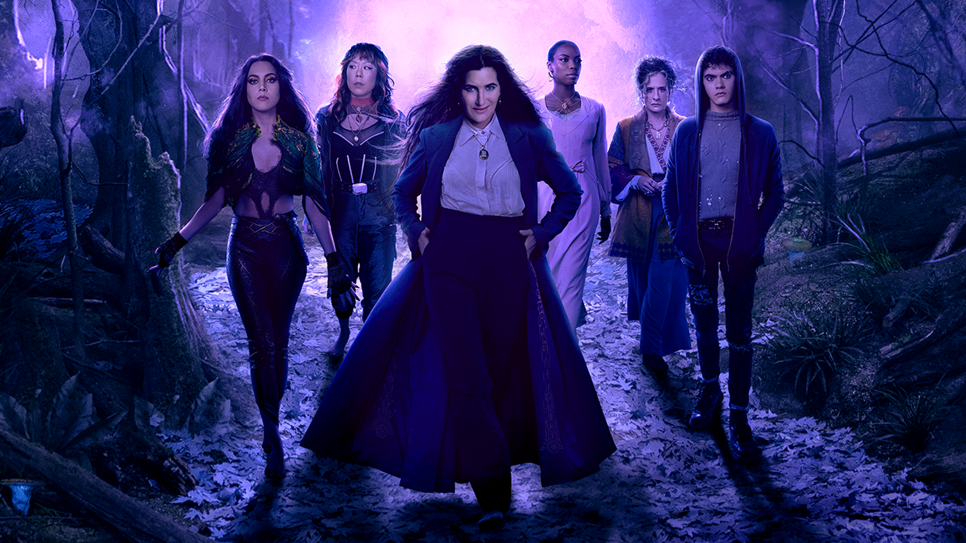 Agatha (Katheryn Hahn) and her coven walk down the witches road.
