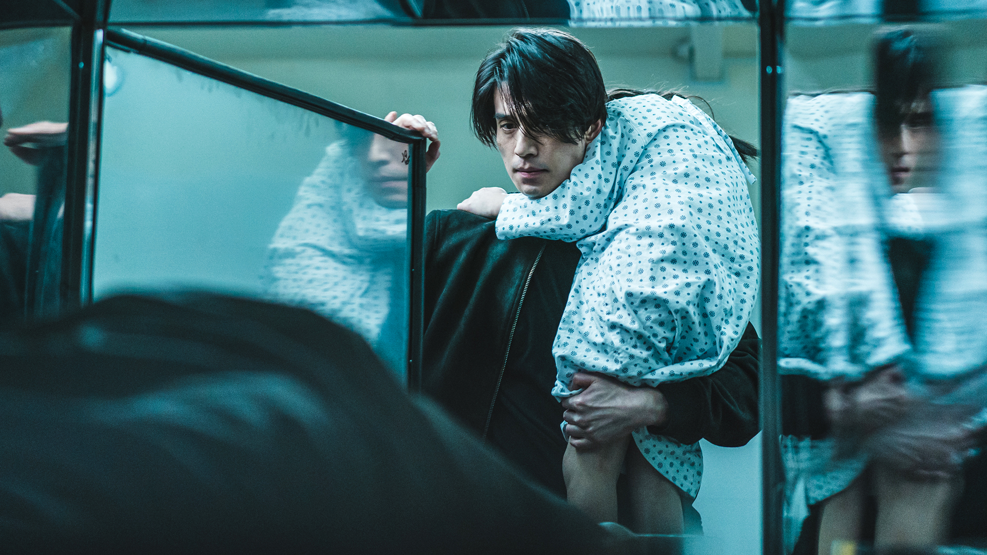 This image features actor Lee Dong-wook starring as the character Jeong Jin-man in the action thriller series A Shop for Killers.