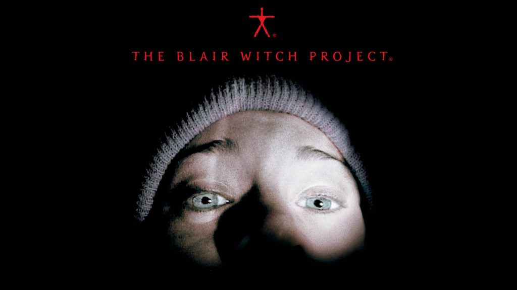 Title art for The Blair Witch Project featuring a terrified face illuminated in the dark with the red Blair Witch symbol above.
