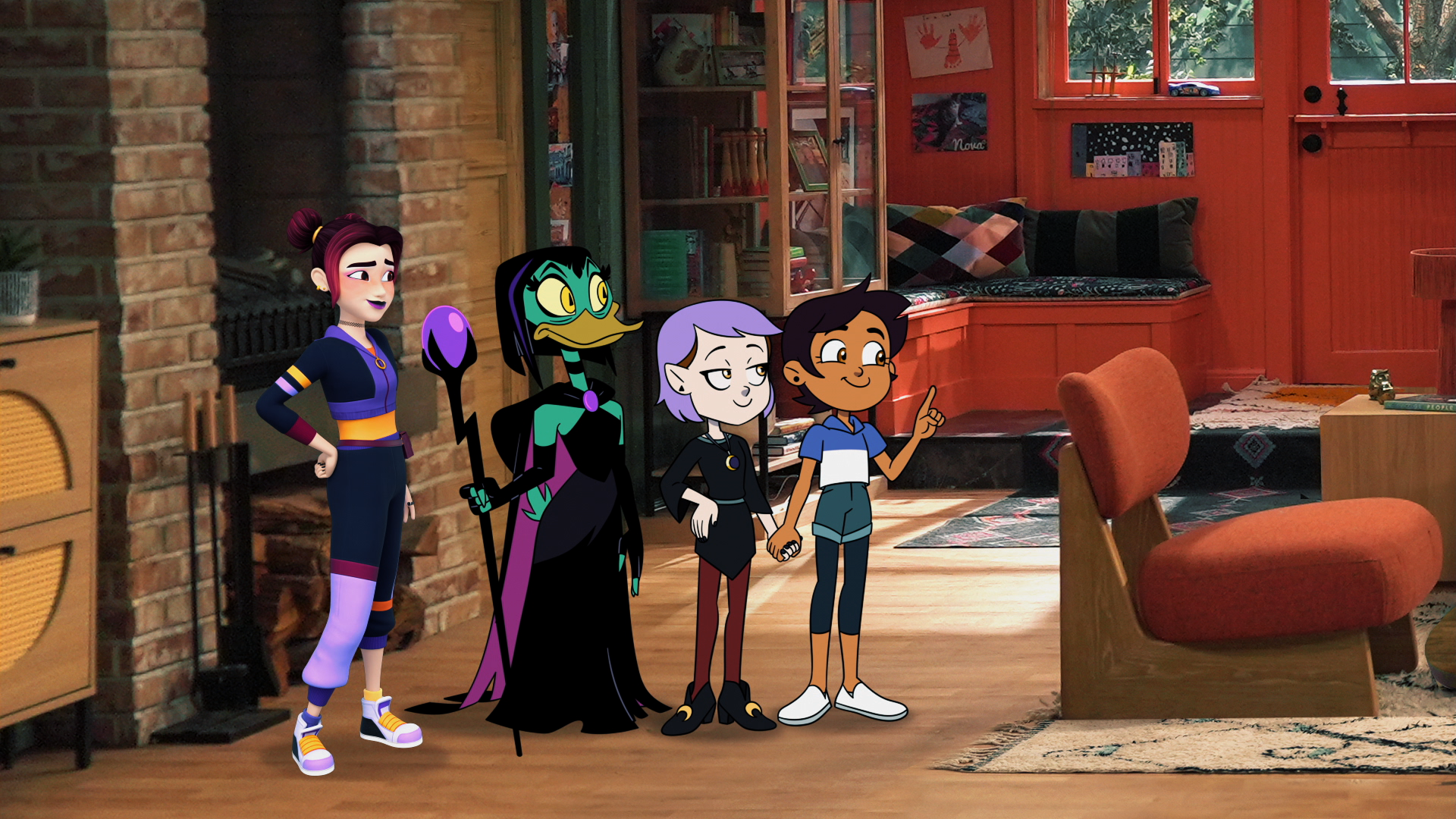 This image features animated characters Luz Noceda and Amity Blight from the series The Owl House interacting with other figures in a live-action setting.