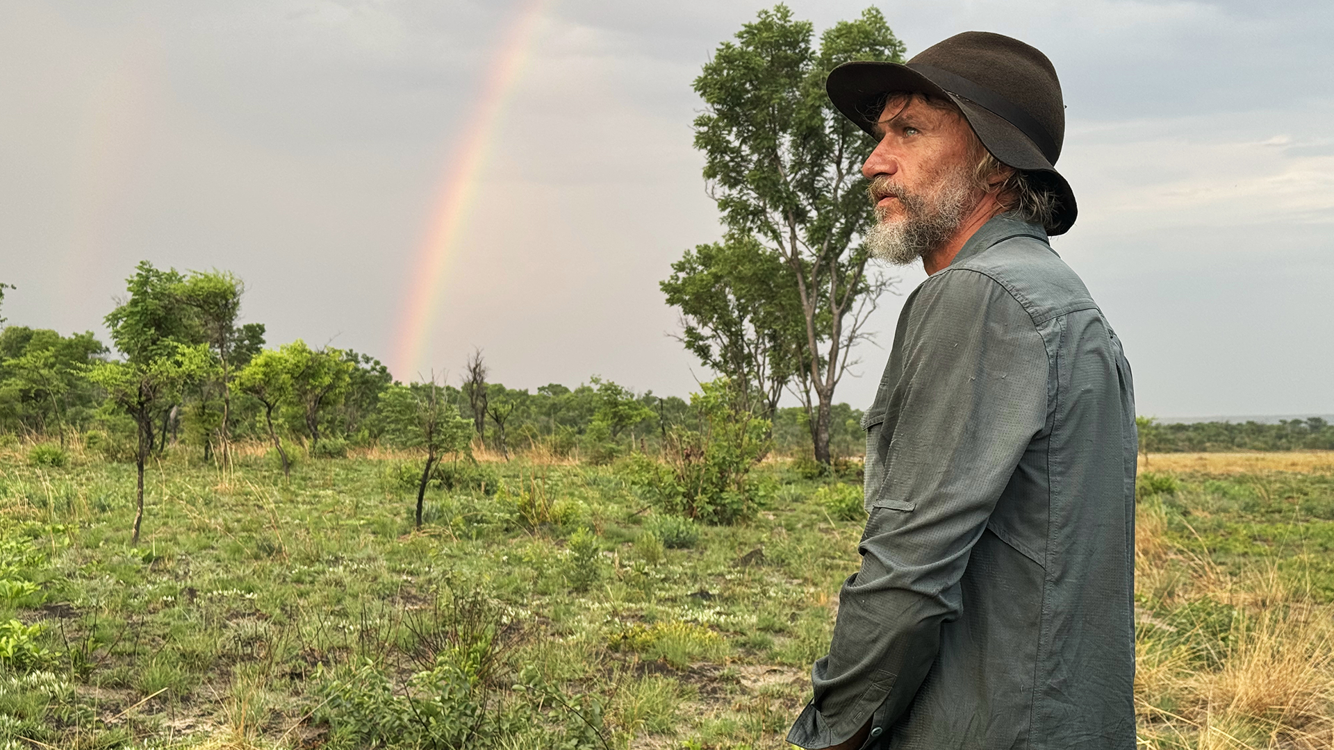 This image captures a moment from the 2026 documentary Ghost Elephants, featuring conservation biologist Dr. Steve Boyes. 