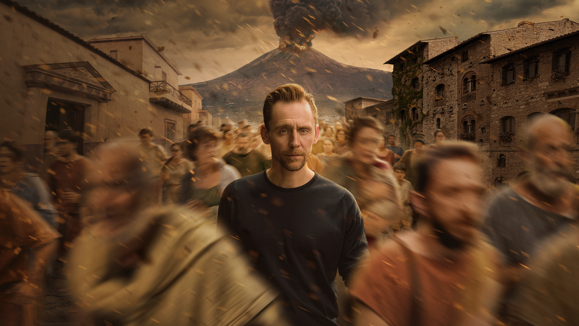 This image features actor Tom Hiddleston in a promotional still for the National Geographic docudrama Pompeii: Out of Time with Tom Hiddleston.