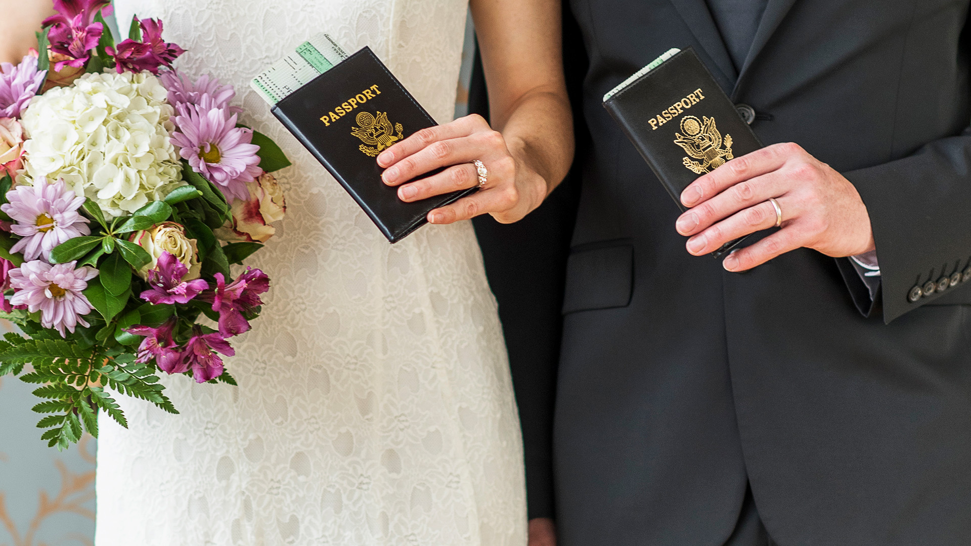 Newlywed couple holding U.S. passports and wedding bouquet on 90 Day Fiancé.