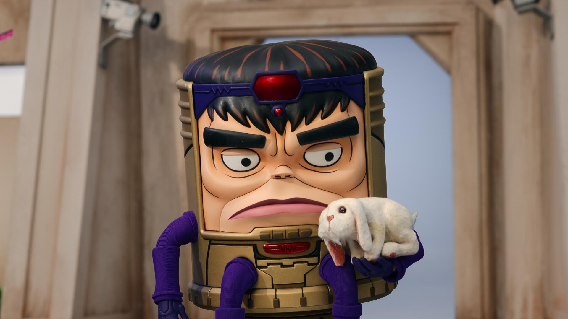 MODOK (Patton Oswalt) holding a white bunny rabbit in M.O.D.O.K animated series