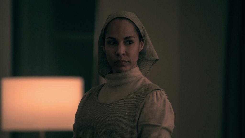A still image of Amanda Brugel as Rita Blue in The Handmaid’s Tale.