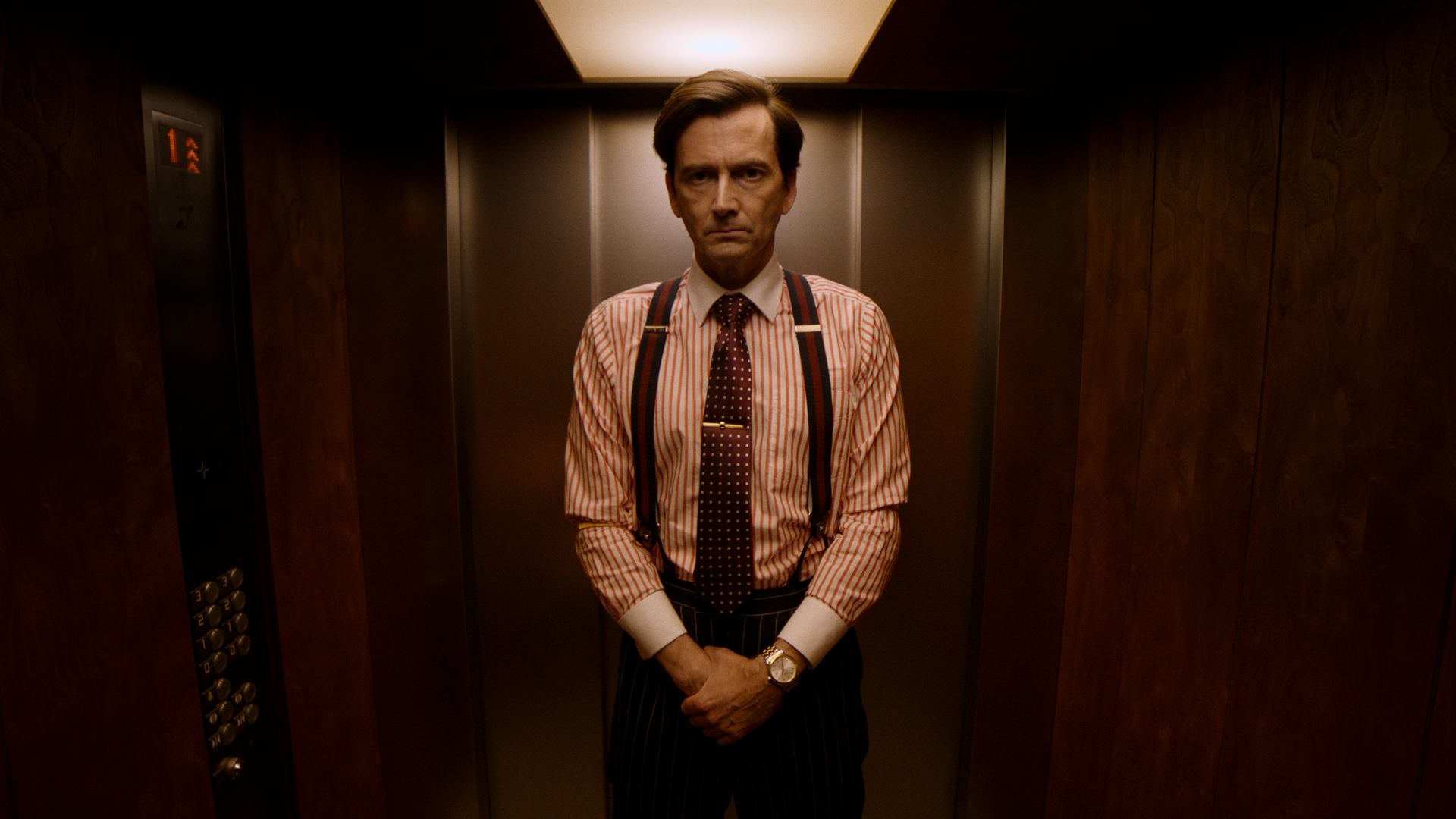 This image features David Tennant playing the role of Tony Baddingham in the 1980s-set period drama Rivals.