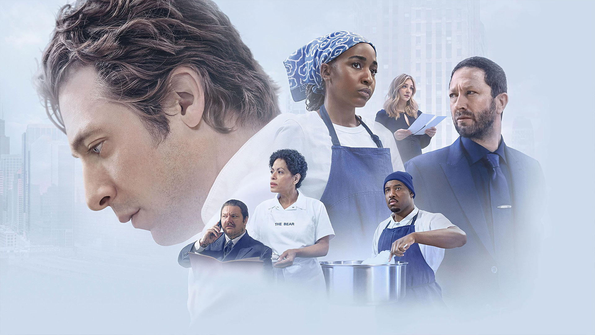 Key art for The Bear featuring multiple characters from the restaurant team arranged around a large portrait of the head chef against a city backdrop.
