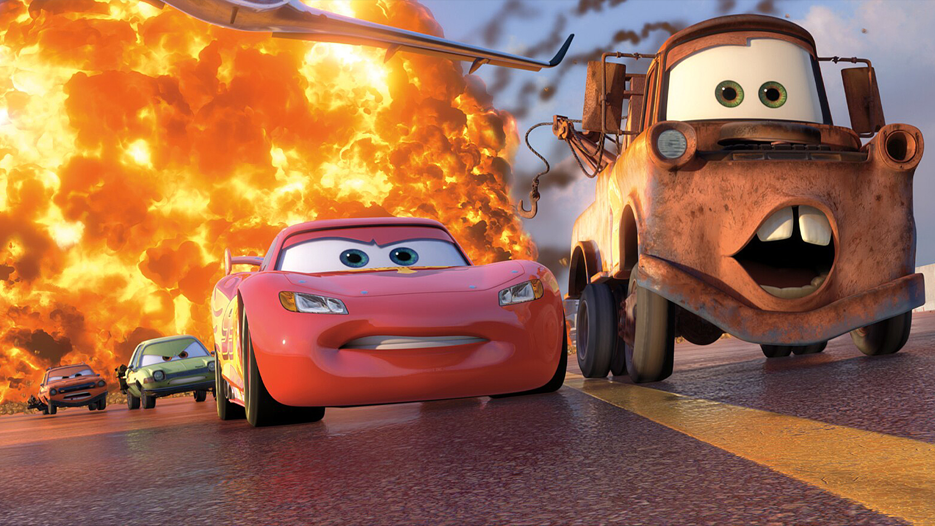 Lightning Mcqueen and Mater are being chased by 2 other cars as they escape fire